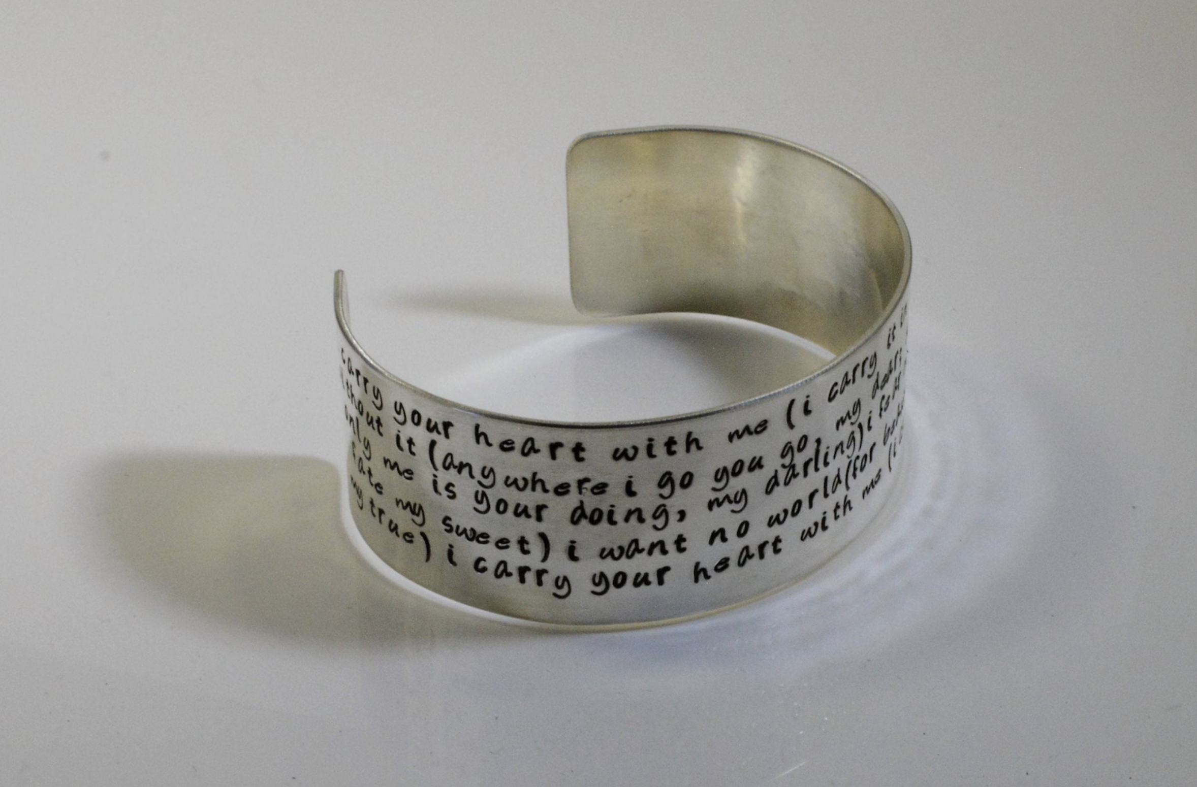 PurplePelicanJewelry (via Etsy) e.e. cummings Cuff