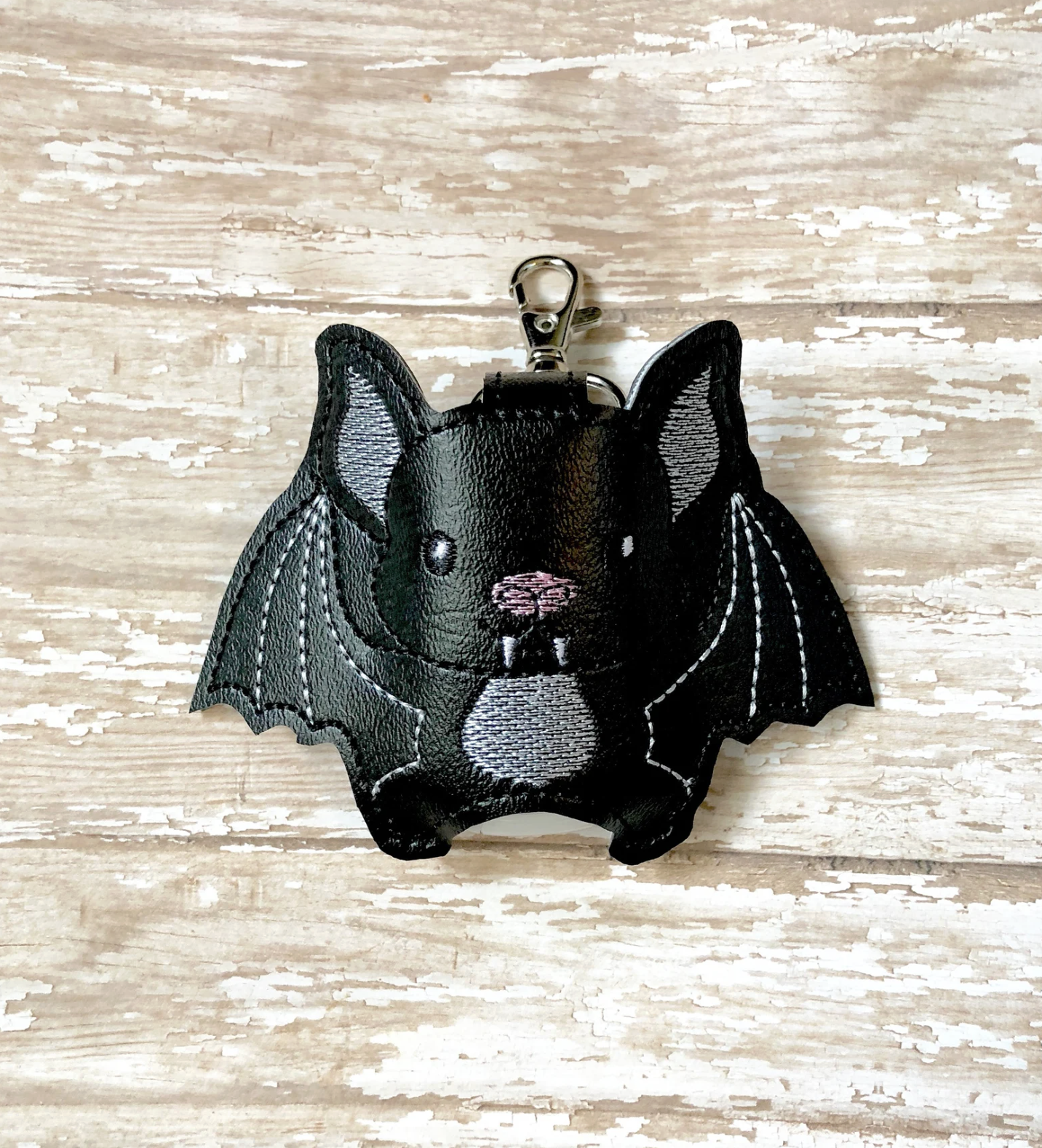 WhileEllieDreams (via Etsy) Bat Hand Sanitizer Holder