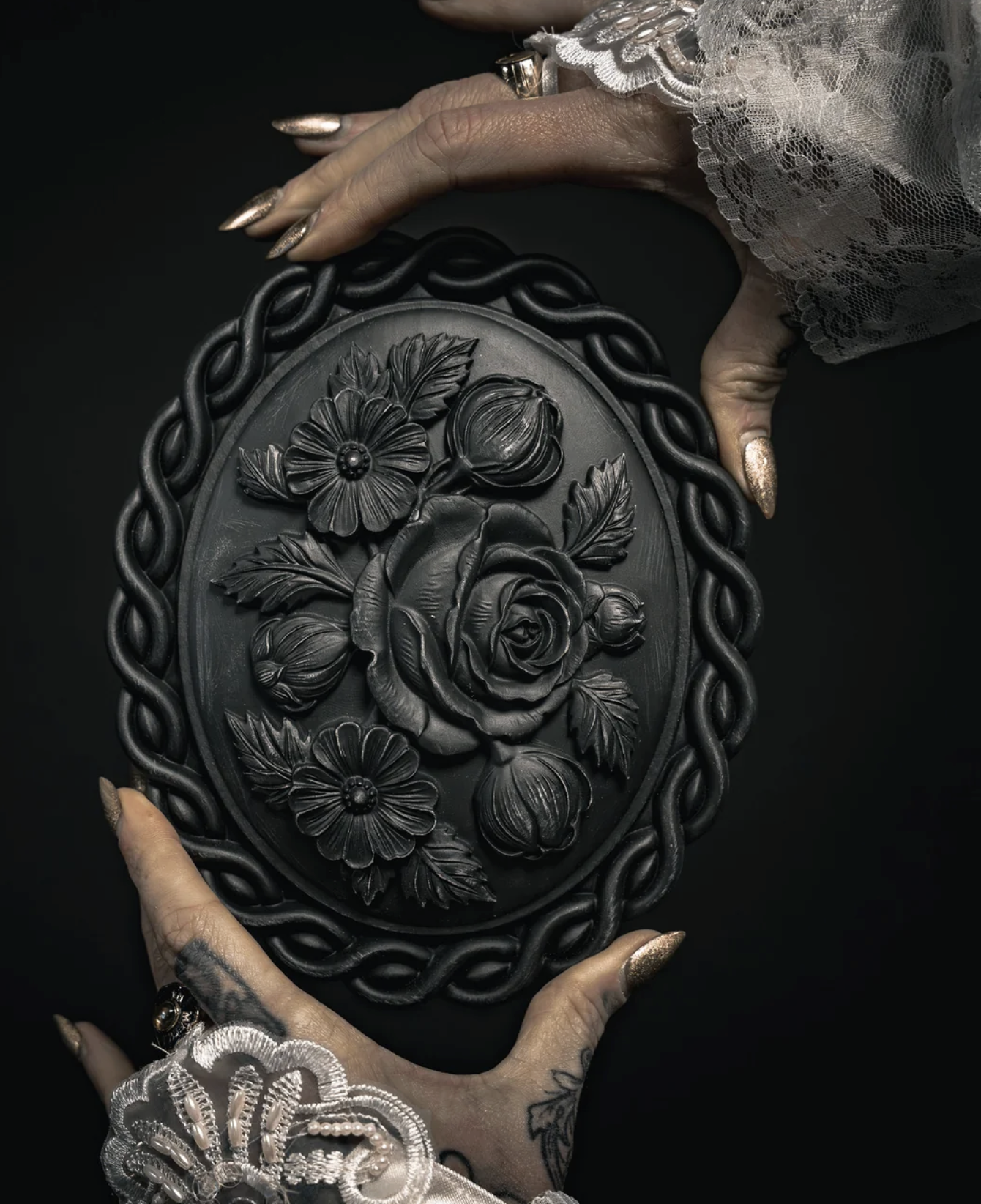 The Blackened Teeth, Widow’s Bouquet Brooch Hanging