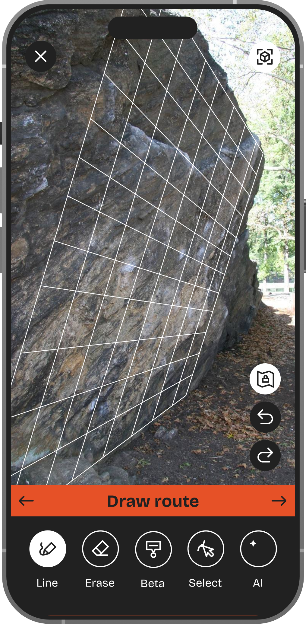 Mobile phone screen showing a rock climbing route planning app with a grid overlaid on a rock face.