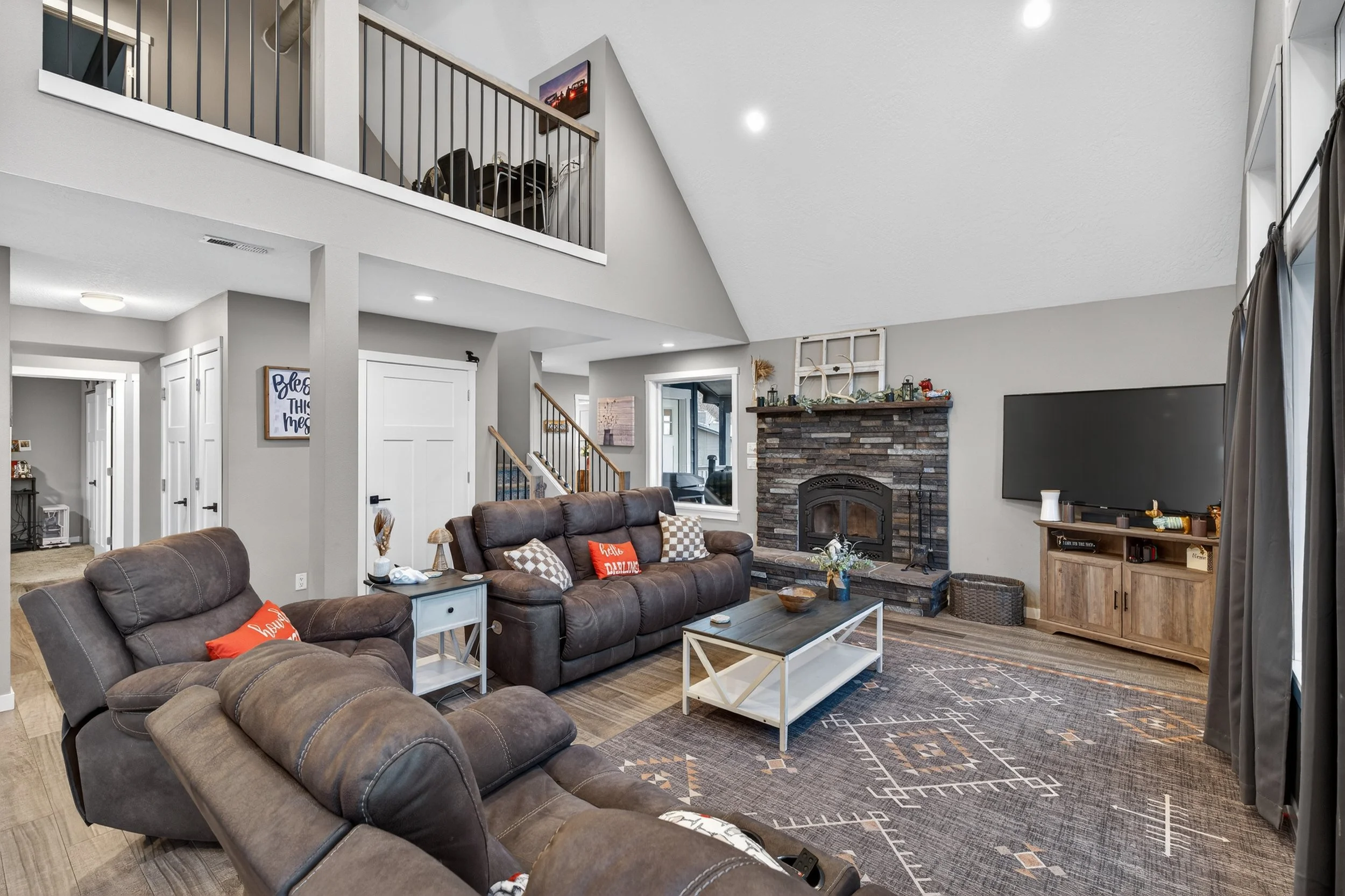 Living room with loft in Waterfront Property - Real Estate Photography Spokane Washington