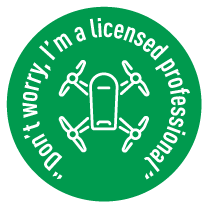 Green circular badge with white text that says "Don't worry, I'm a licensed professional" and features an outline of a smartphone surrounded by four dental tools.