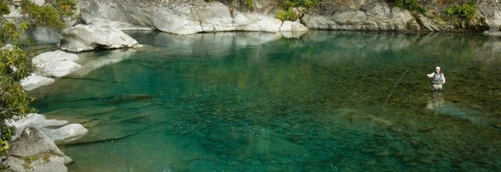 Fly fishing in Nelson backcountry with Stonefly Lodge guide