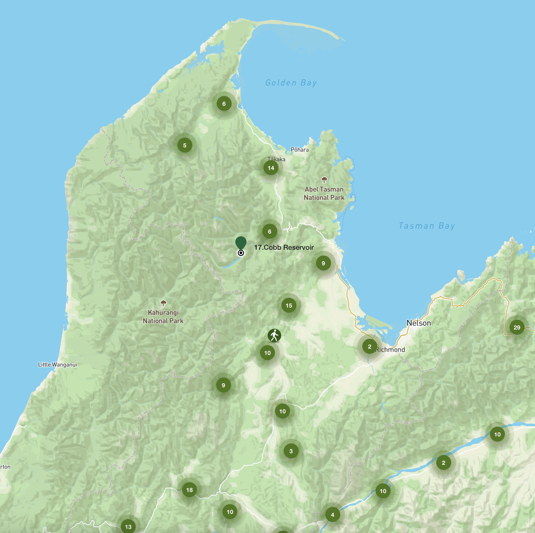 Map of New Zealand highlighting various locations and national parks, including the Cobb Reservoir and Abel Tasman National Park, with topographical features and bodies of water like Golden Bay and Tasman Bay.