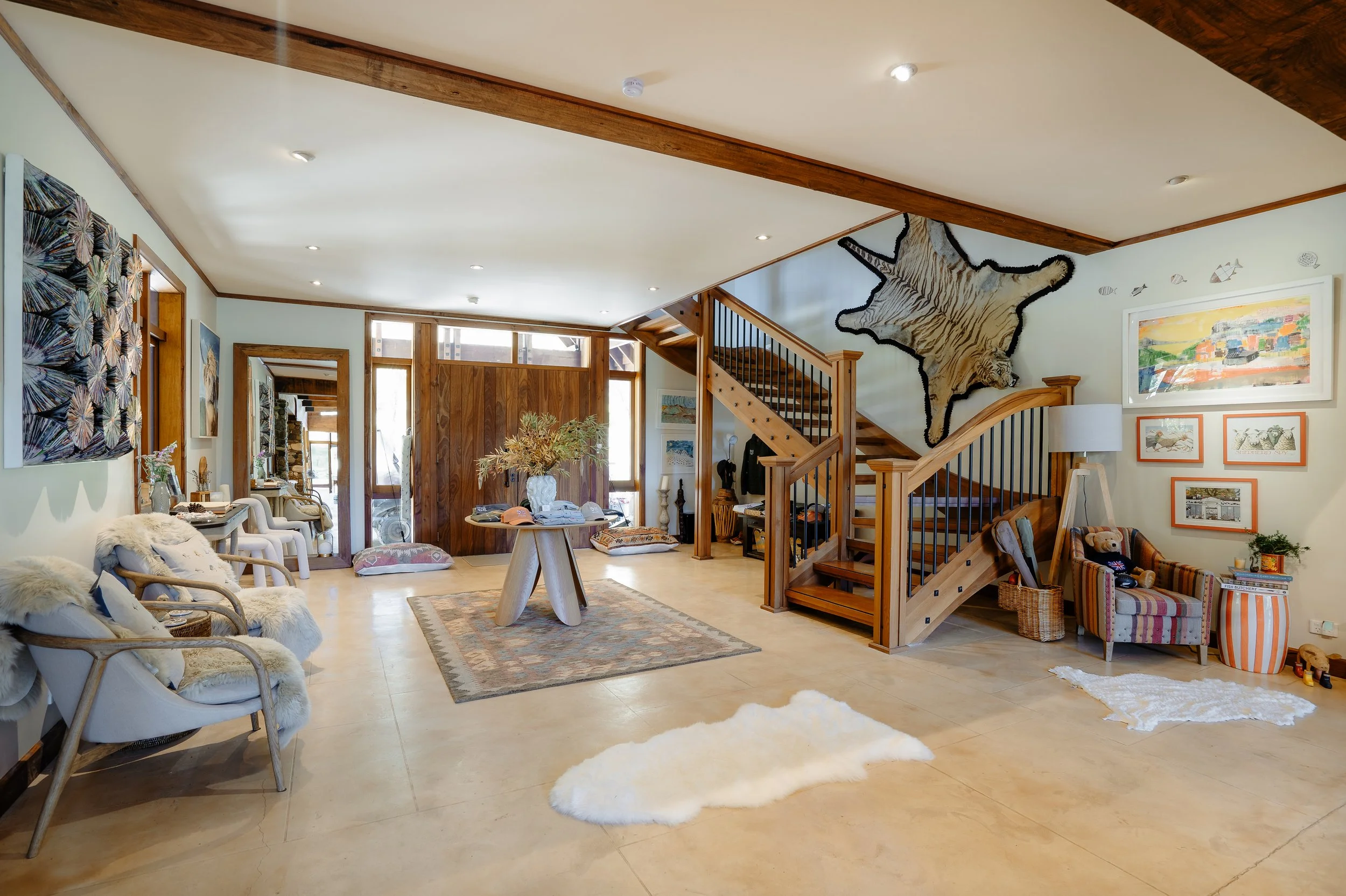 Foyer with wooden doors at Stonefly Lodge