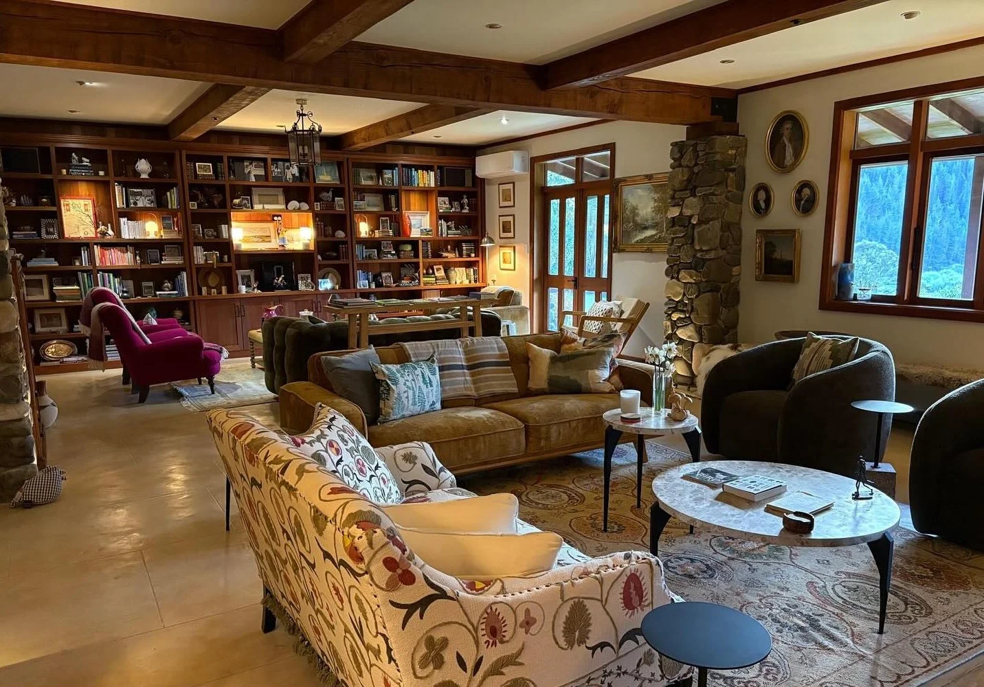 Library lounge with comfortable seating at Stonefly Lodge