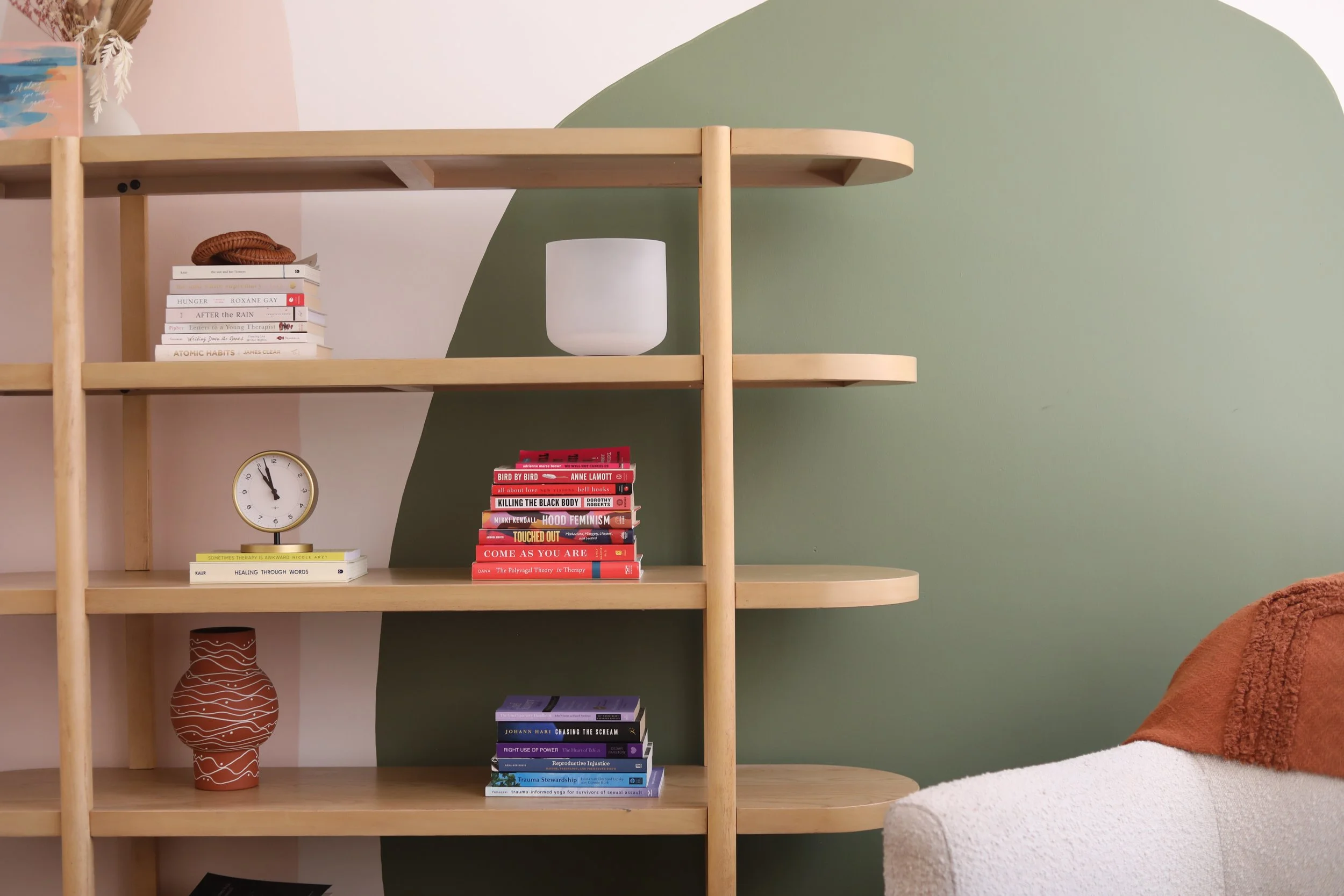 Books and decor in a calming therapy office in Irvine designed for individual, couples, and family therapy.