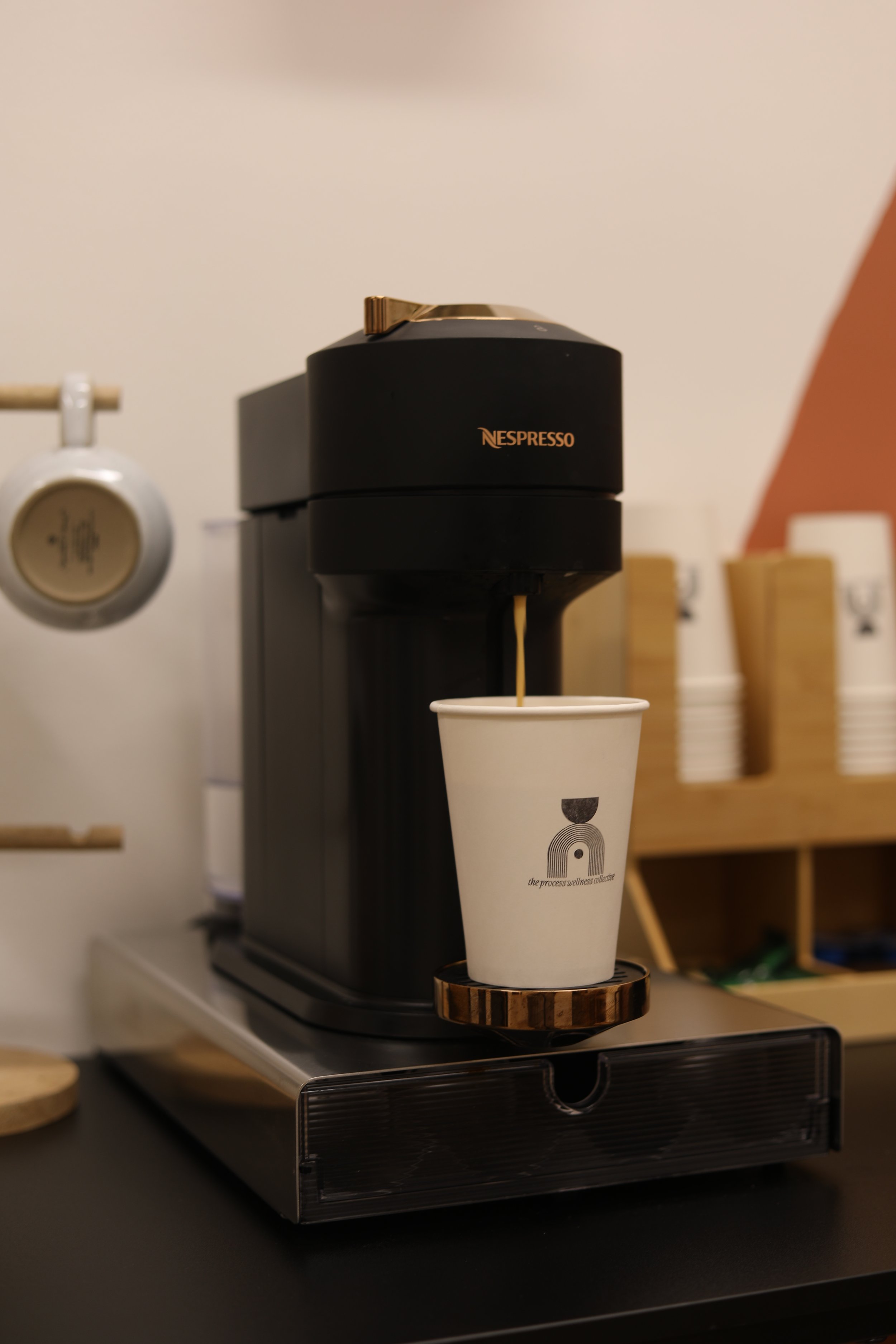 Coffee machine in a welcoming Irvine therapy office preparing coffee for clients.