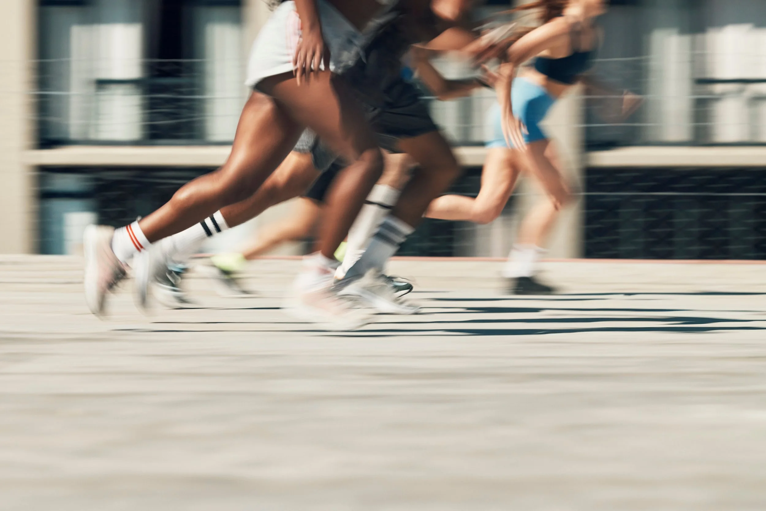 Blurred runners in motion representing growth, momentum, and strategic movement for modern brands and organizations.