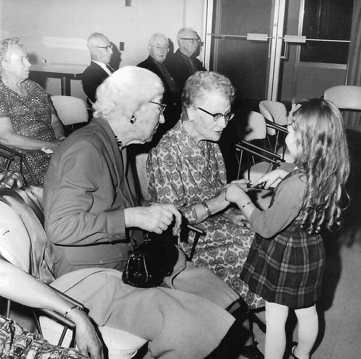 Wayne and Joy Warner had an evening church service ministry to the retirement home in Hopedale. This is daughter Lori with some of the residents.