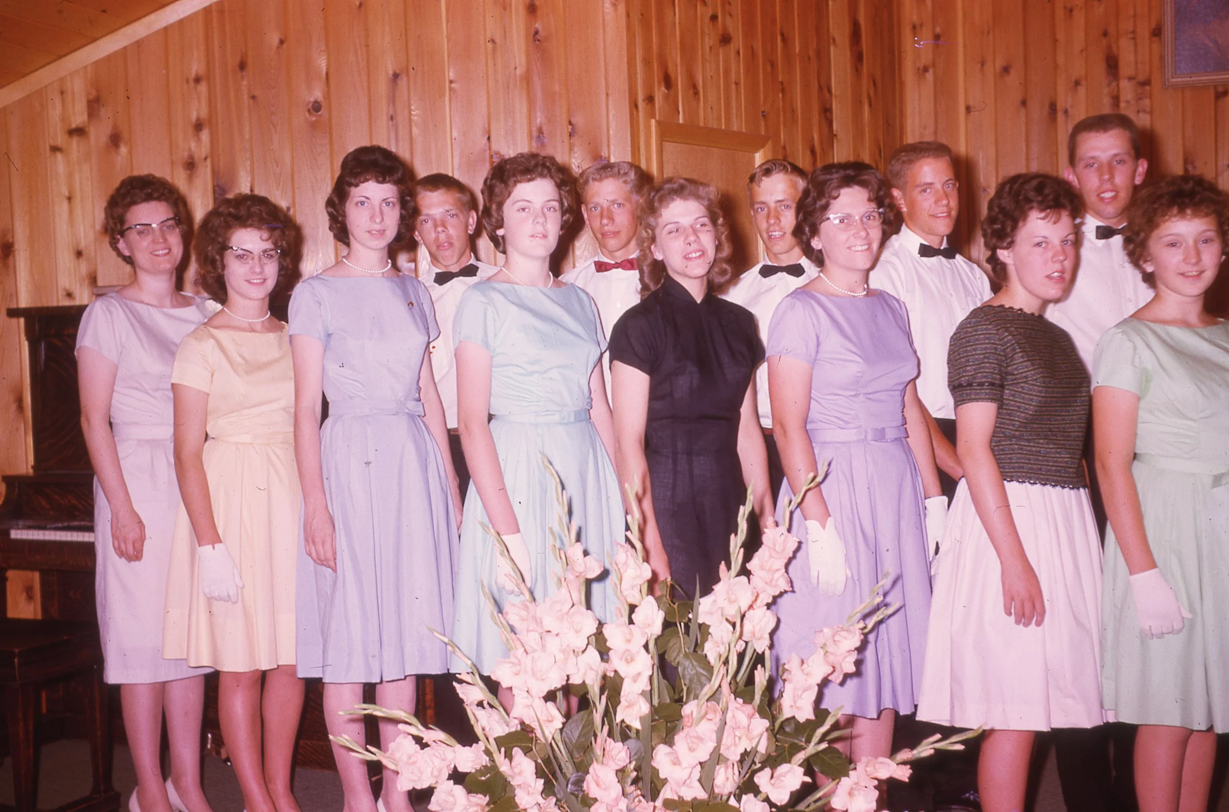 Mrs. Daryl Anderson, pastor's wife, on the far left with young adult members of the congregation.