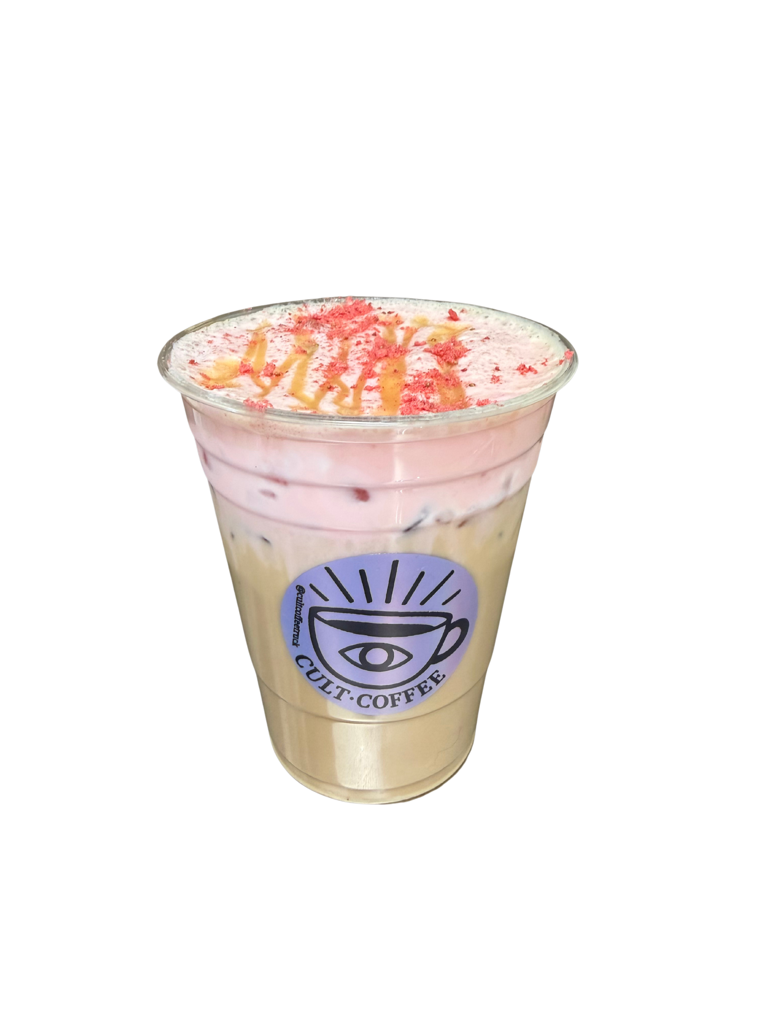 A layered iced coffee beverage in a clear cup with pink whipped cream, caramel drizzle, red sprinkles, and a straw, featuring a Cult Coffee logo.