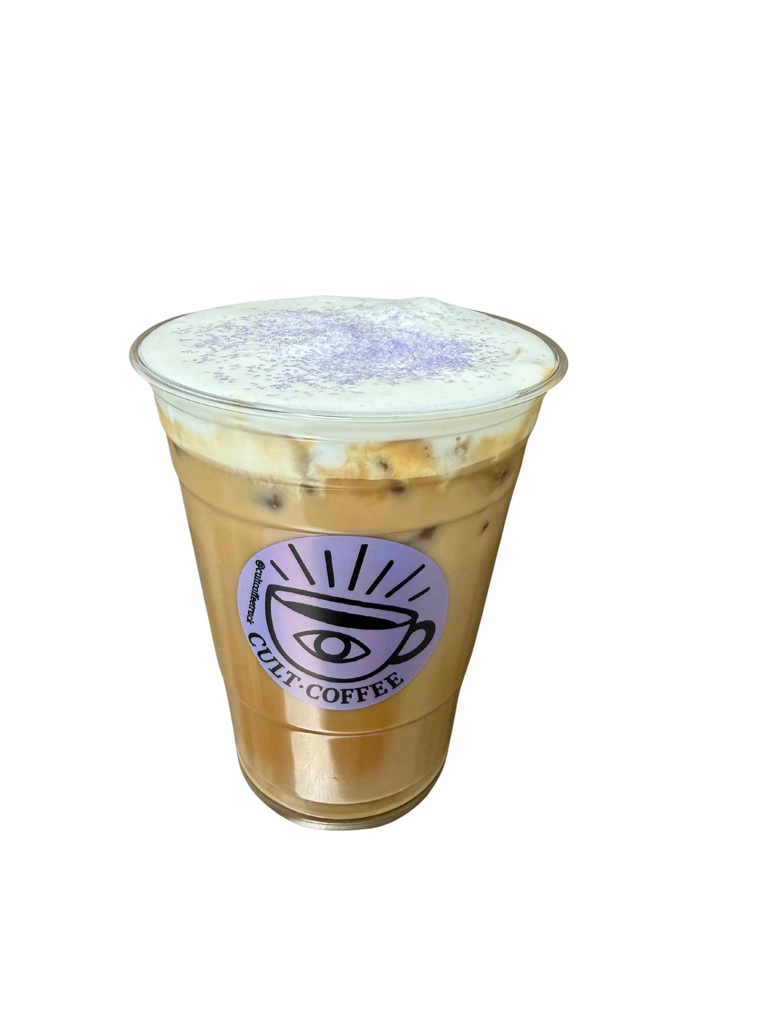 Iced coffee with cream and purple sprinkles in a plastic cup with a 'CULTI.COFFEE' logo and an eye design.