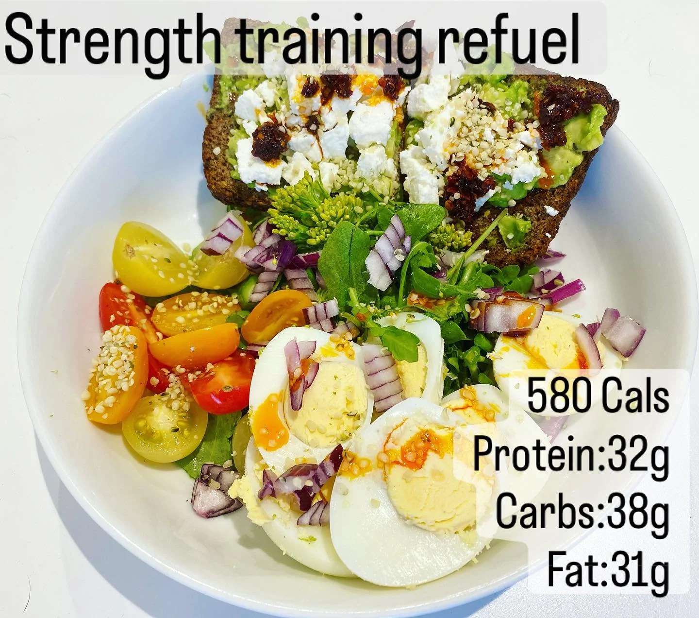 Eat the rainbow for a post training refuel munch 🌈💪🏻

✔️Quick 
✔️Simple 
✔️SUPER Nutritious

🥚 3 boiled eggs 
🥑 1/4 Avo 
🧀 31g Feta 
🌱 All the veggies (tomatoes/rocket/broccoli/red onion)
🍞 @bionaorganic Chia &amp; Flaxseed Rye Slice 
🥄 Tsp 