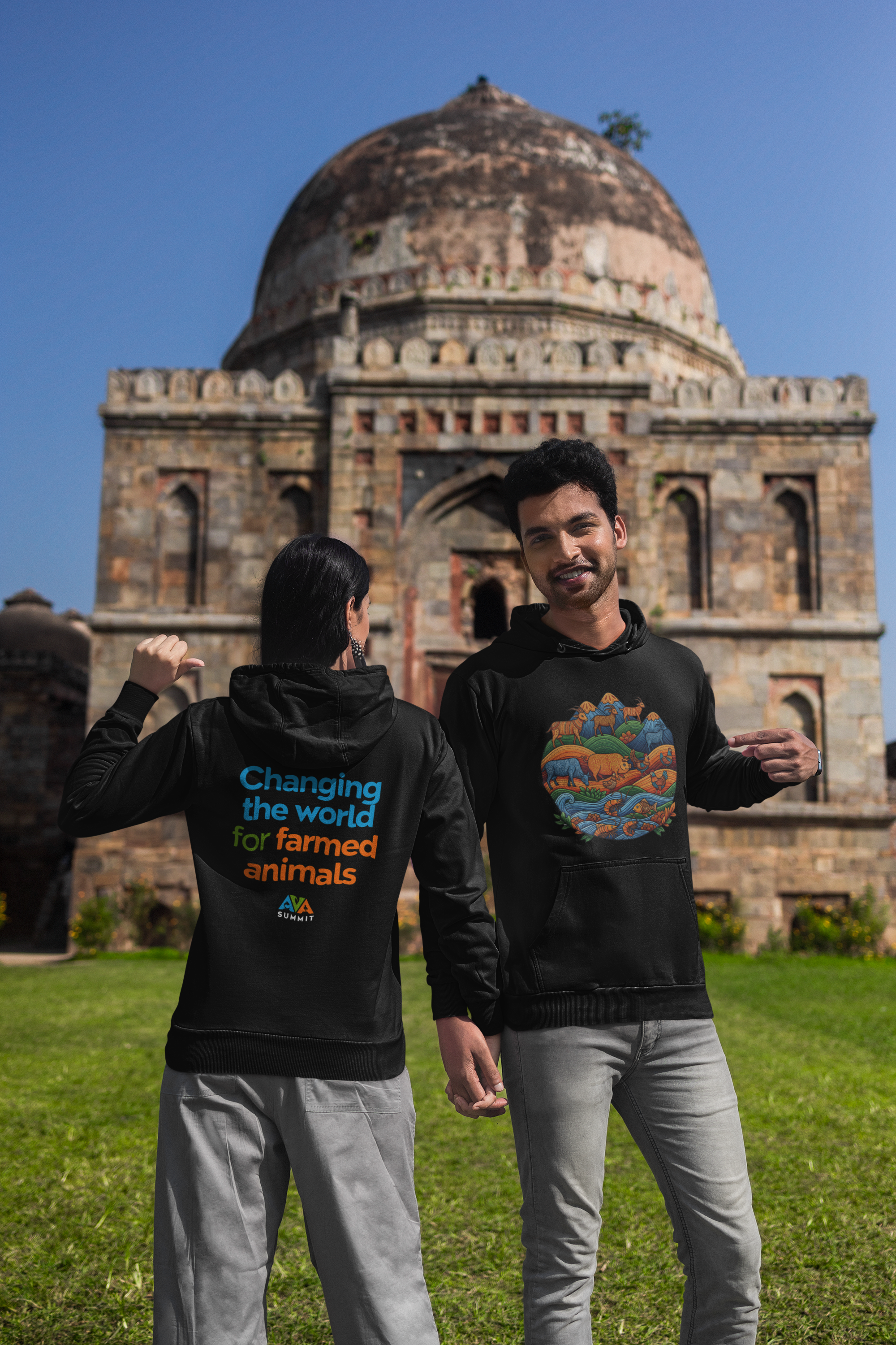 mockup-of-a-man-and-a-woman-pointing-at-their-new-gildan-pullover-hoodies-m36902.png