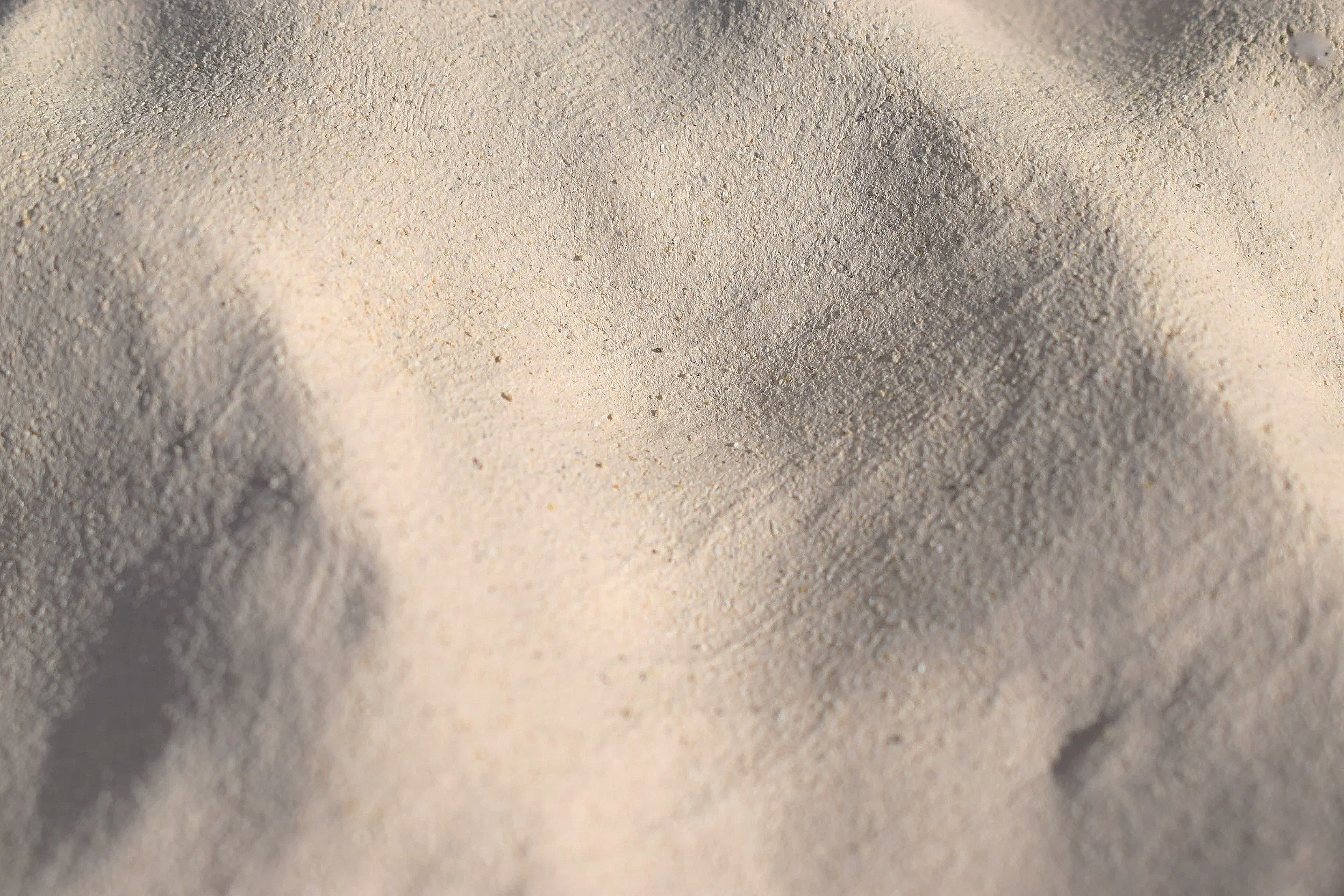 SAND: Unglazed white clay