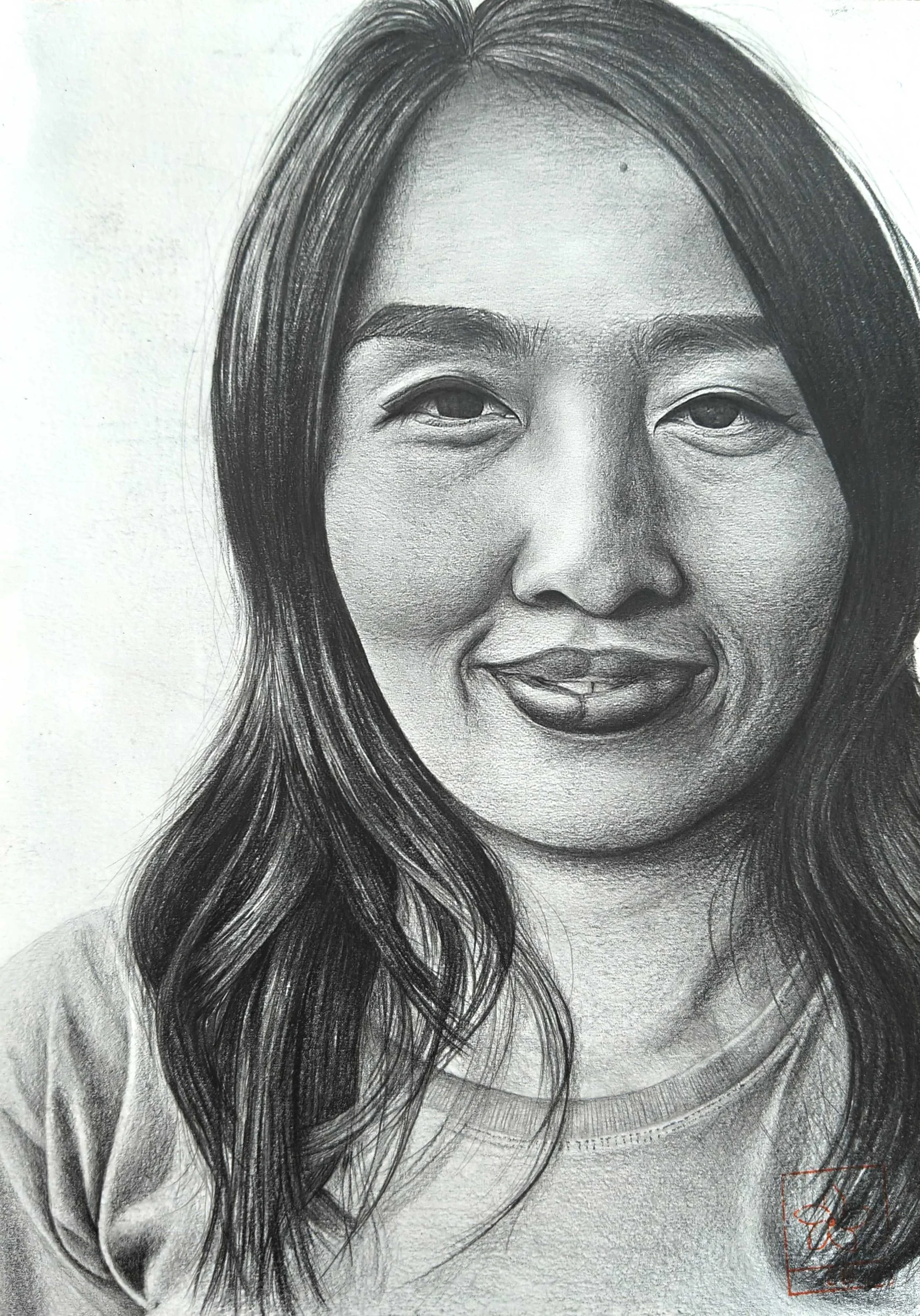 A detailed black and white pencil sketch of a woman with long, wavy hair, smiling slightly, wearing a casual shirt.