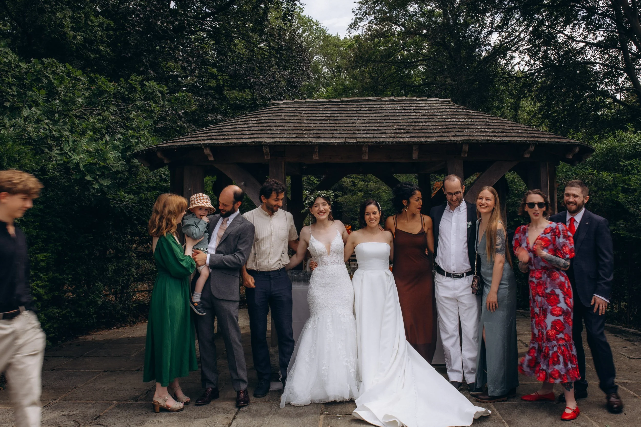 Wedding group photo at Pembroke Lodge gardens
