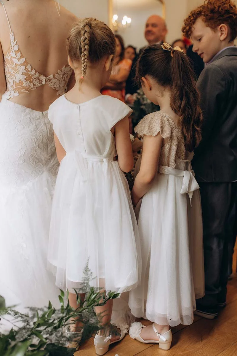 Bride with flower girls at Pembroke Lodge