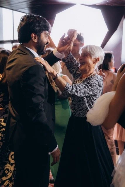 Guests dancing closely together on the dance floor
