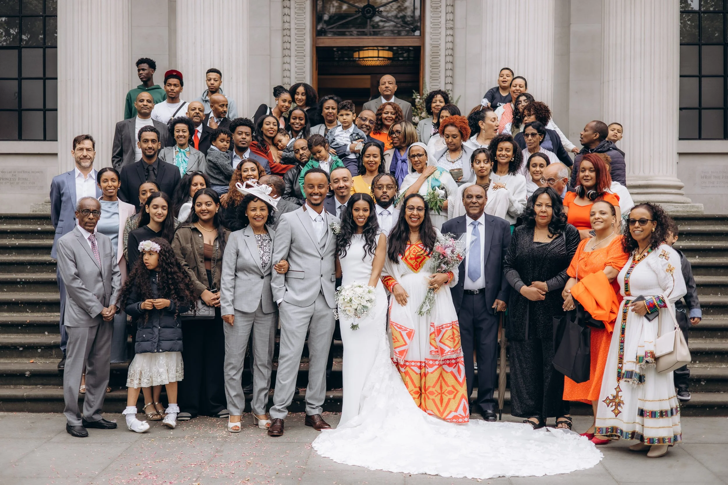 Extended family group photo on the steps of Old Marylebone Town Hall