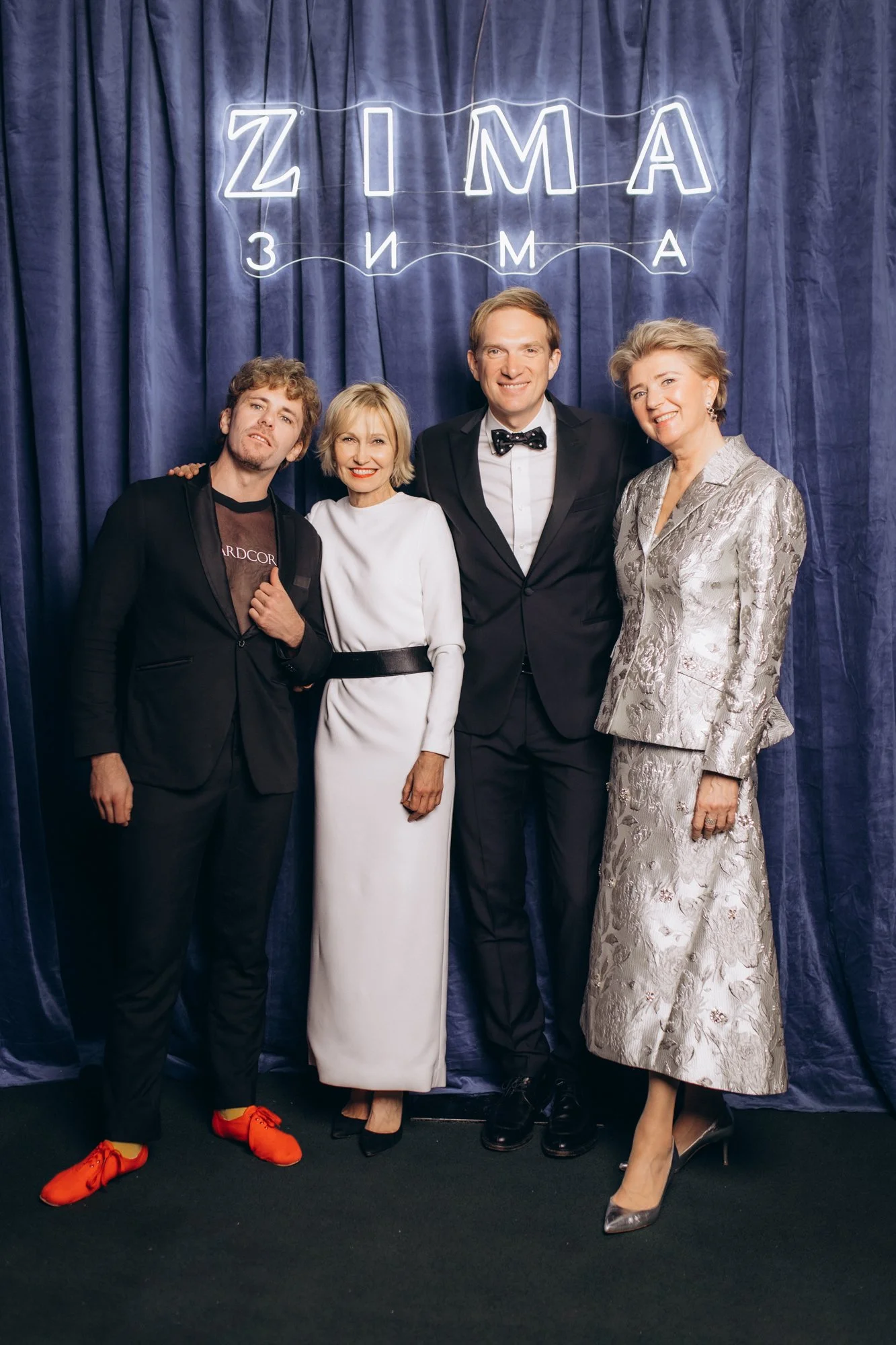People posing for a group photo at charity event