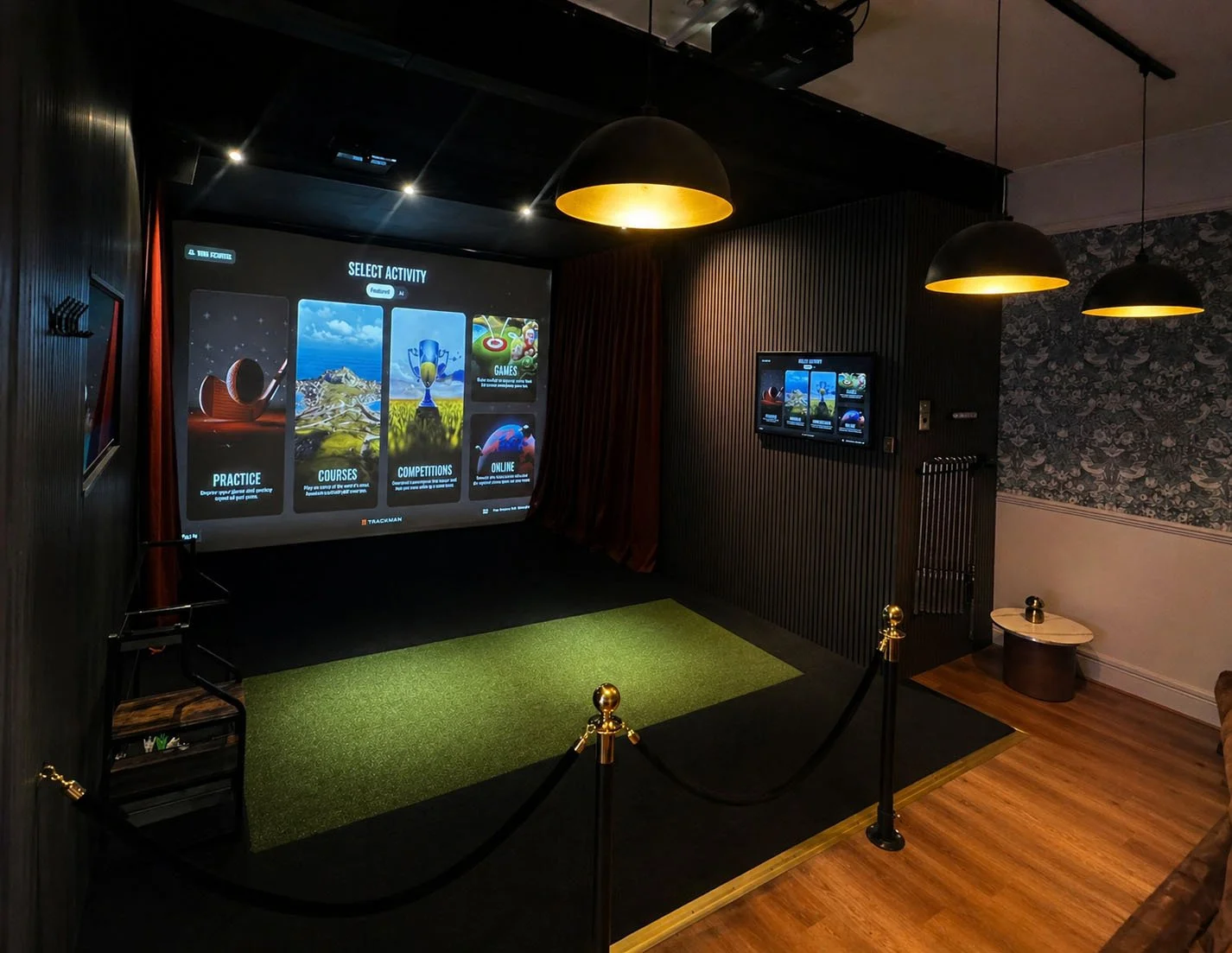 Private indoor virtual golf simulator bay at City Greens Golf in Norwich
