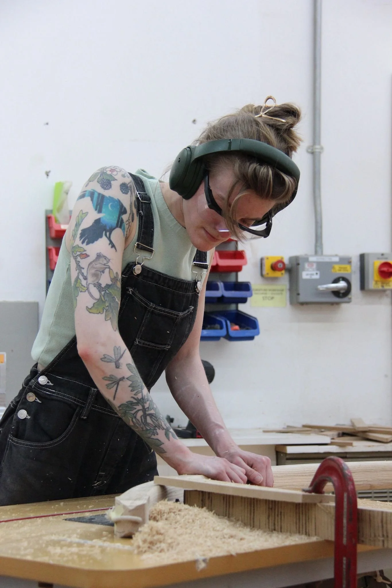 Emily in her workshop working on the Moonlight Bloom Lamp.