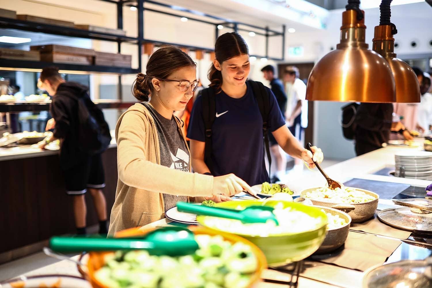 Girls on Nike Sports Camps eating lunch