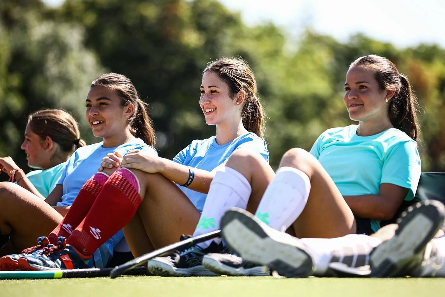 Girls smiling in hockey training session