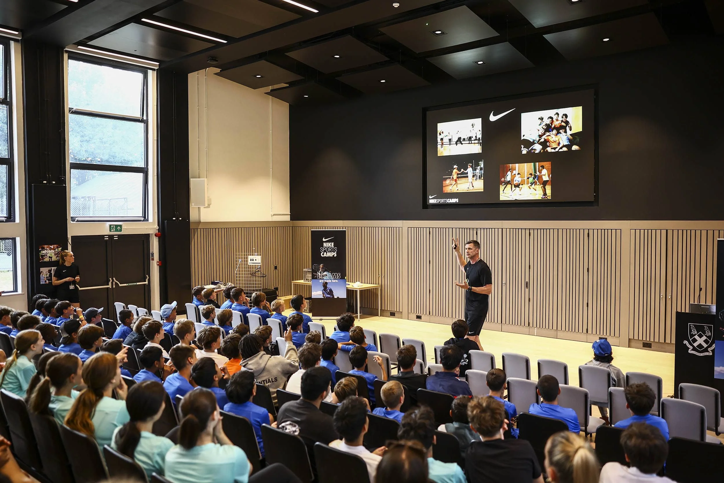 Staff member delivers workshop on Nike camp