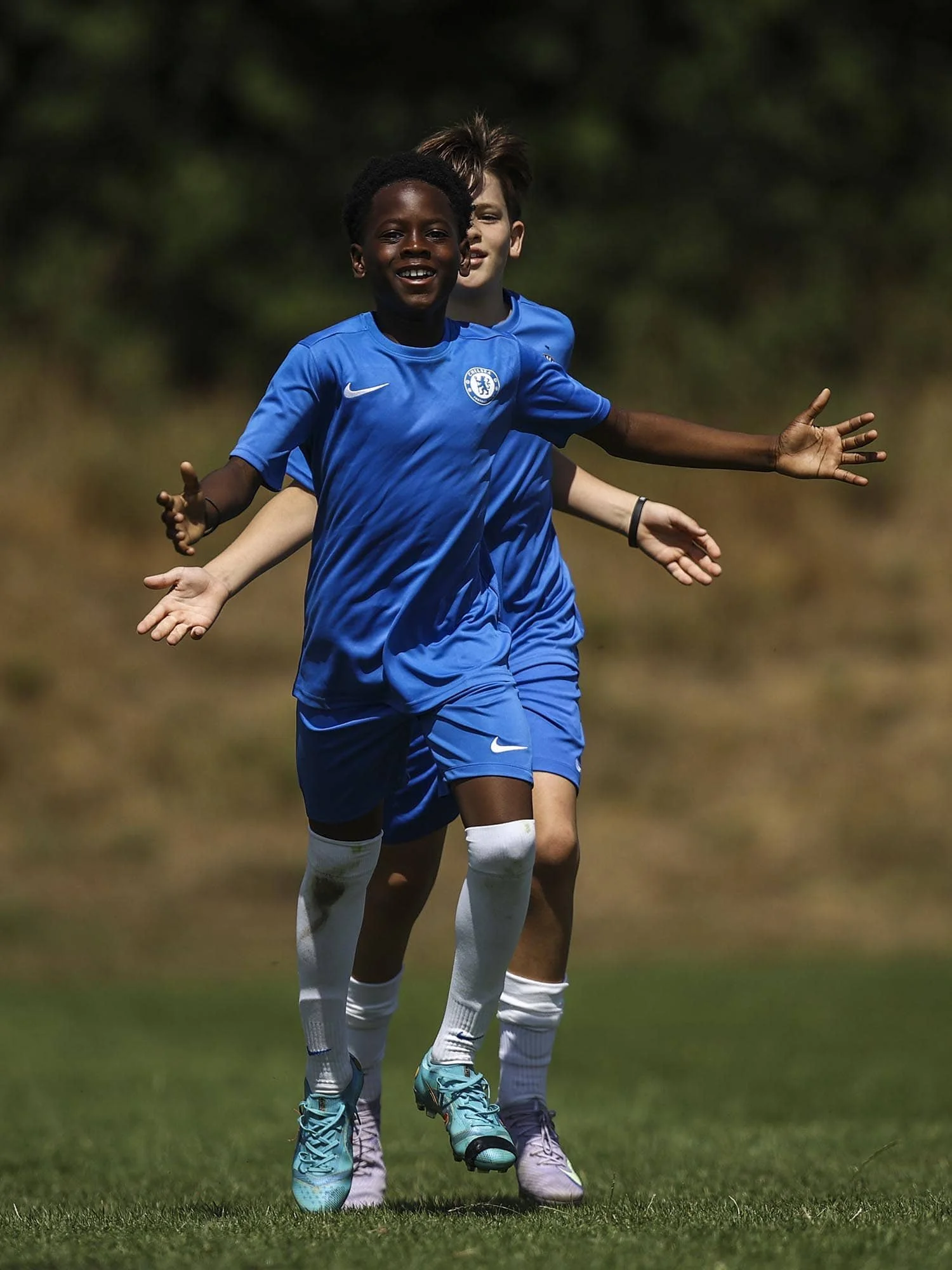 boys having fun on chelsea football camp
