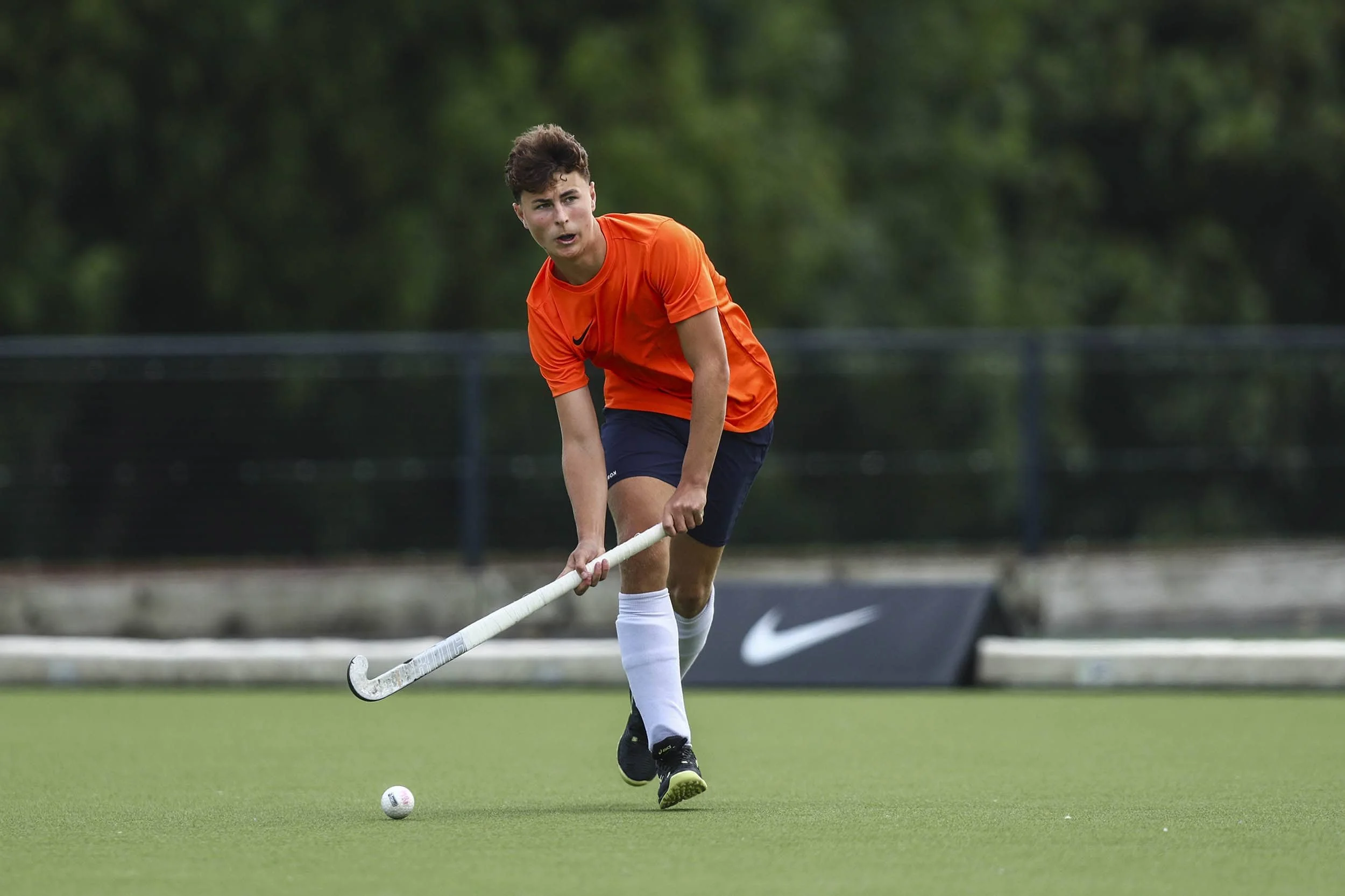 boy playing hockey
