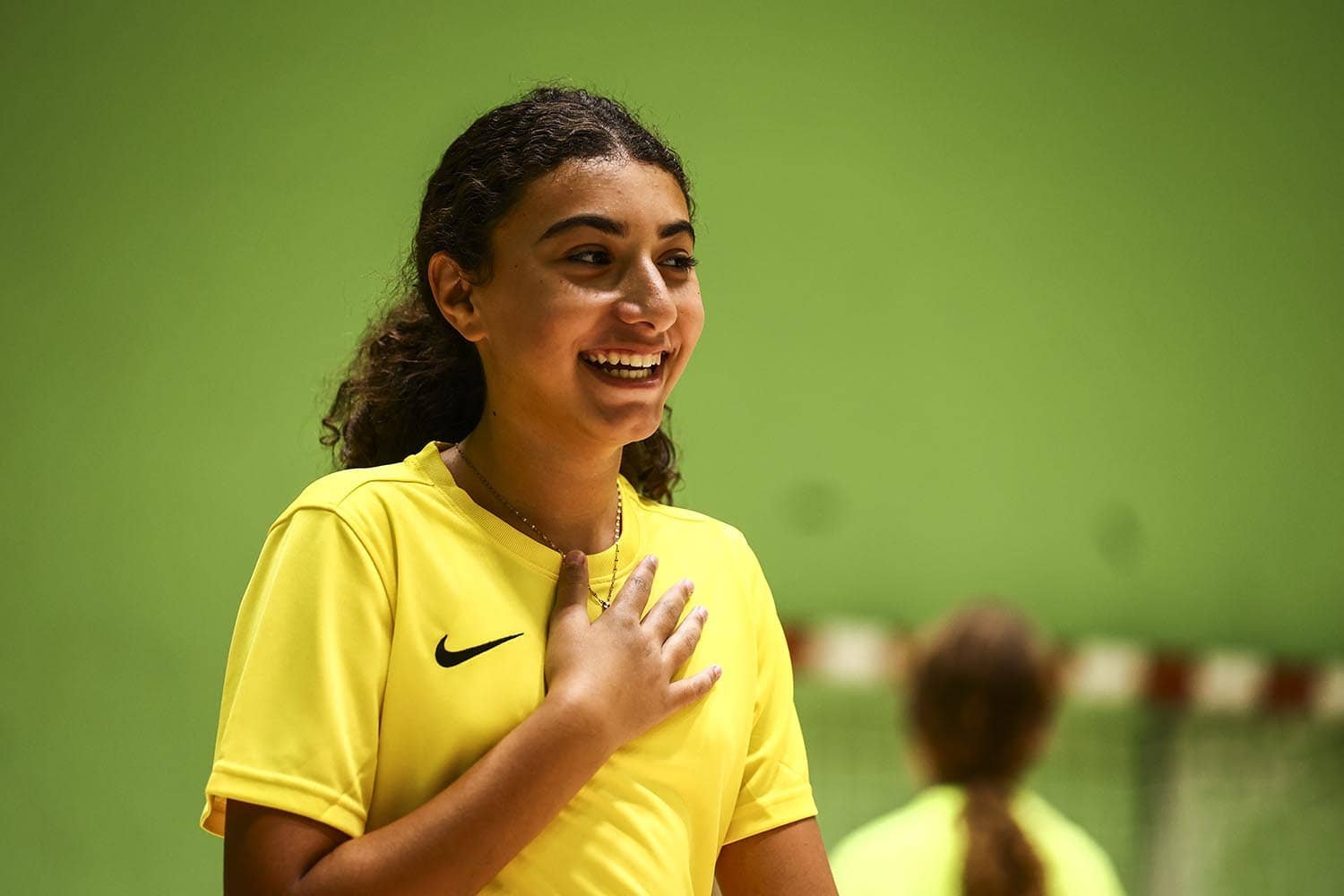 Volleyball player smiling in training