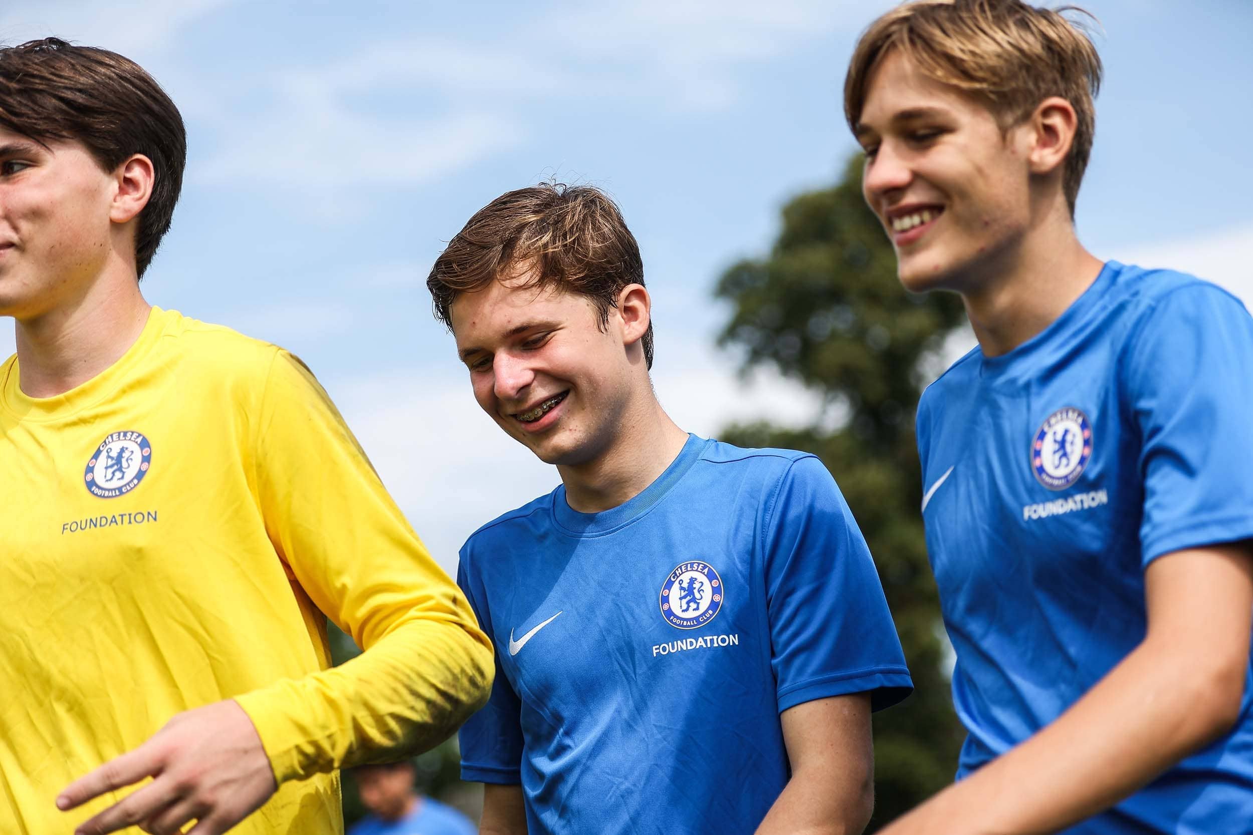 Boys on Chelsea FC Camp smiling in training