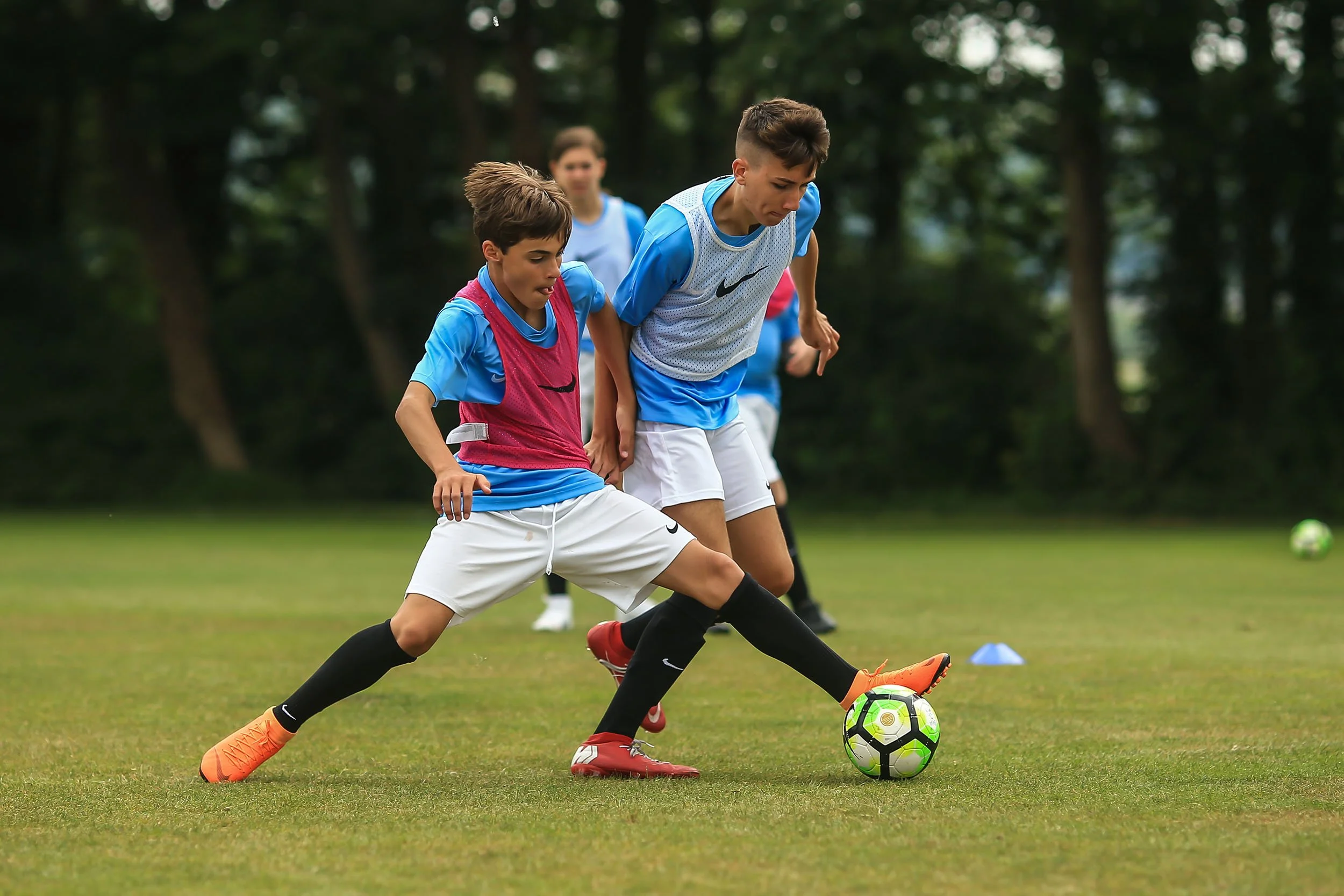 boys playing football