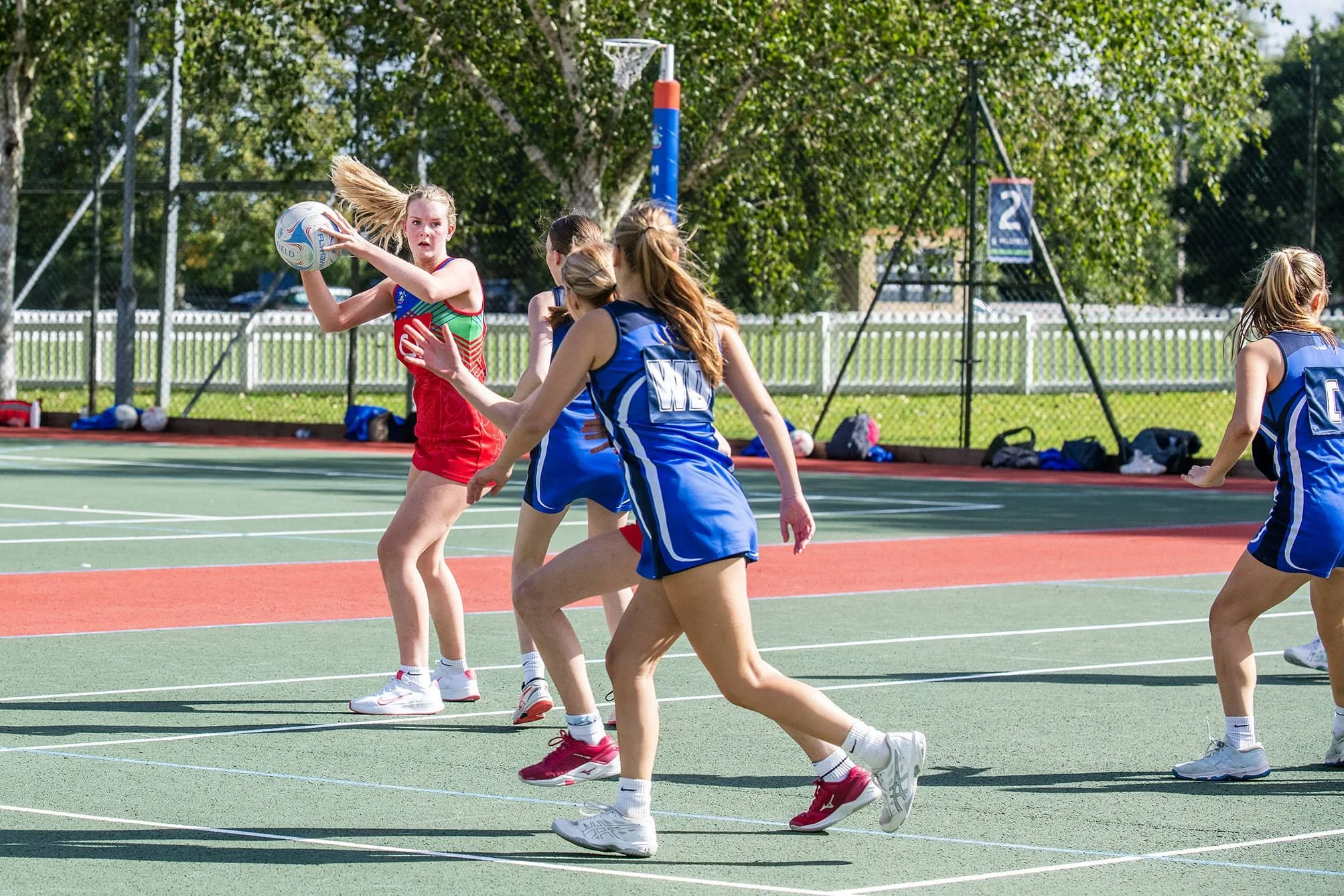 Girls playing netball at Millfield