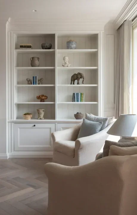 Home staging consultation Kilkenny - living room armchair and bookcase styling edit.