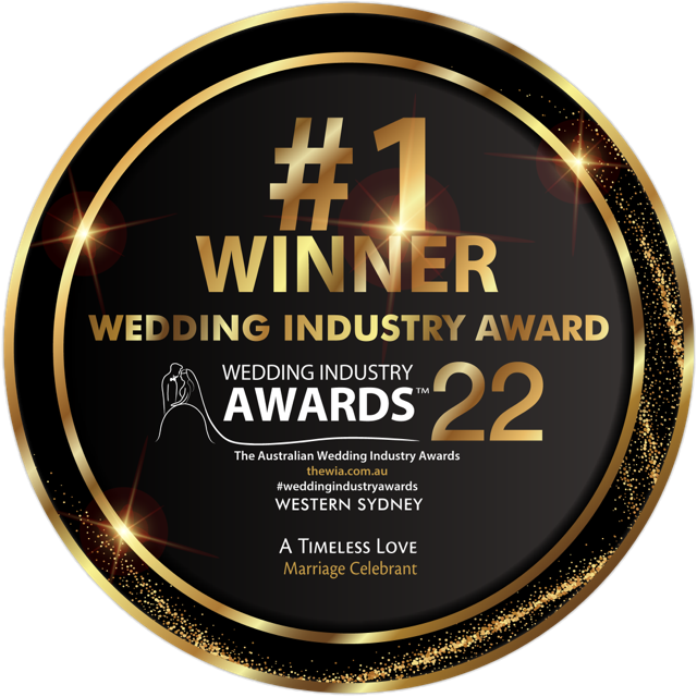 Gold and black circular badge indicating the #1 winner of the 2022 Wedding Industry Awards, presented by Western Sydney, celebrating A Timeless Love by Marriage Celebrant, with celebratory sparkles.