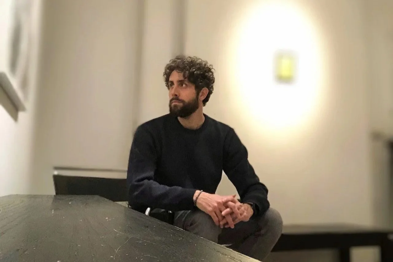 Lorenzo Romani, Italian contemporary artist, at a solo exhibition of his works.