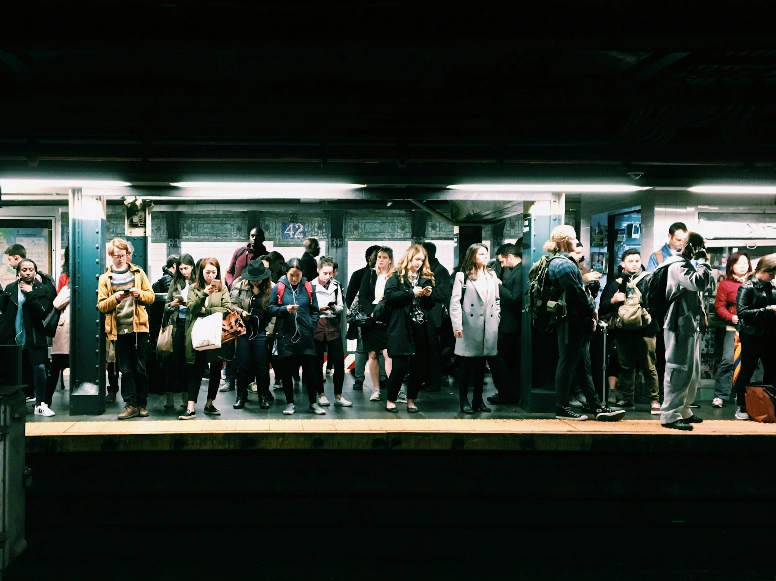 coherence in complexity in modern multicultural metropolitan cities and localities nyc new york city urban people waiting for train