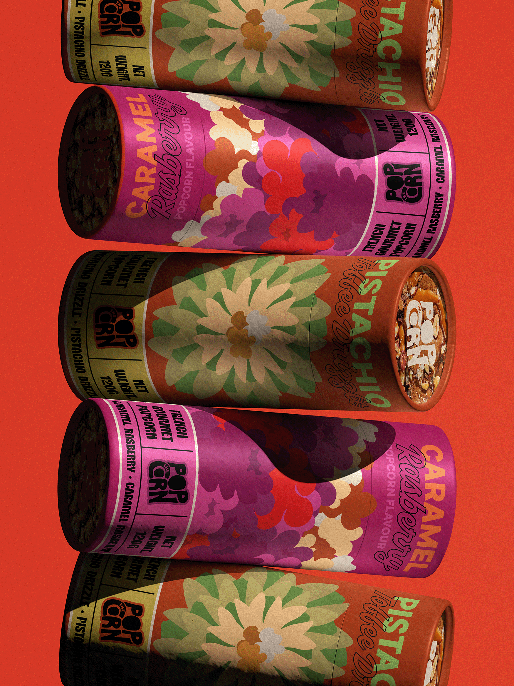 Four cans of popcorn with colorful floral labels, arranged on a red surface. Abubakr Design Co Brand Identity Designer from East London
