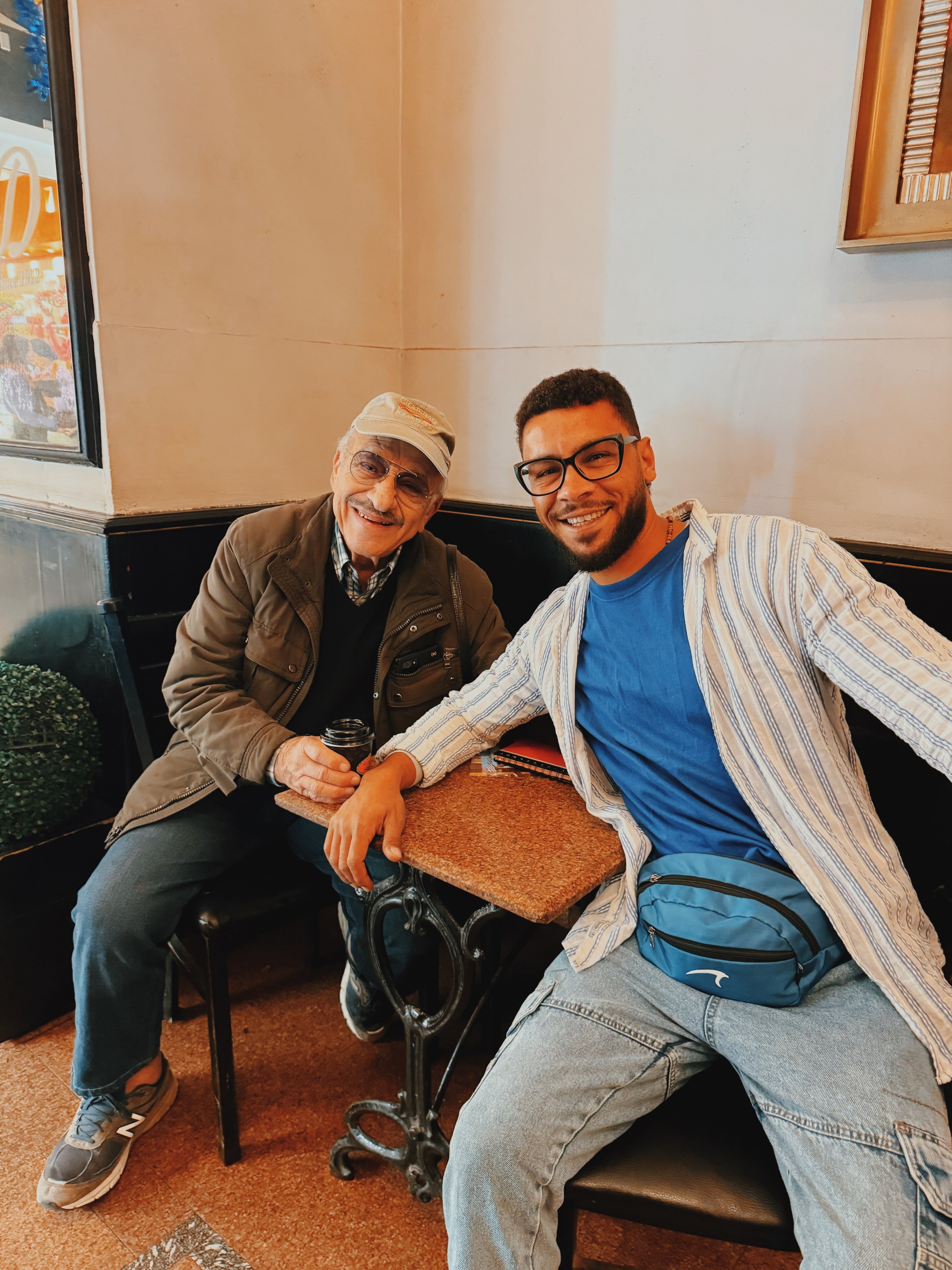 Takemet Tours guest Maurice sharing coffee with Egyptologist Mostafa
