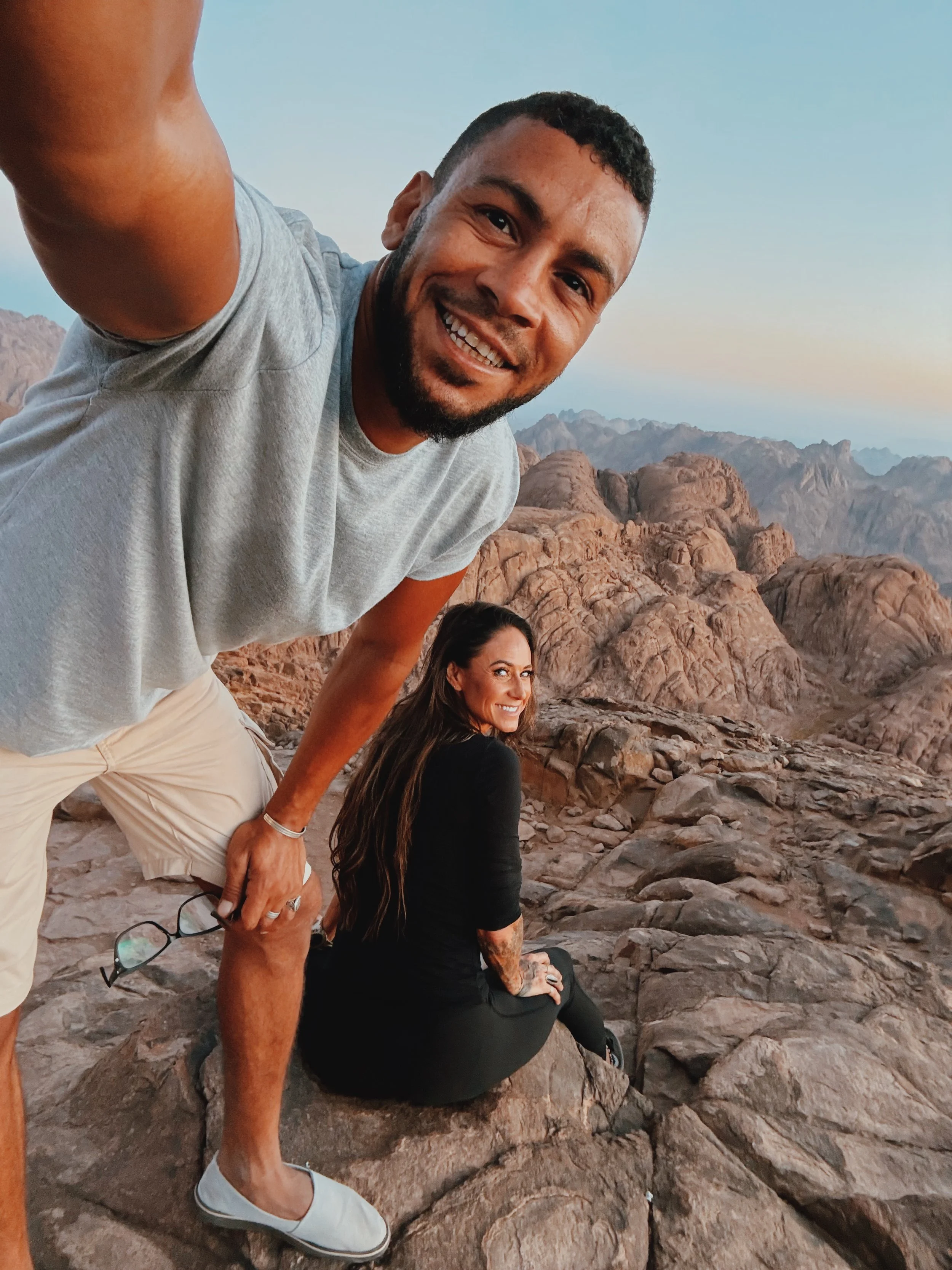 Jennifer and Mostafa of Takemet Tours on the summit of Mount Sinai.