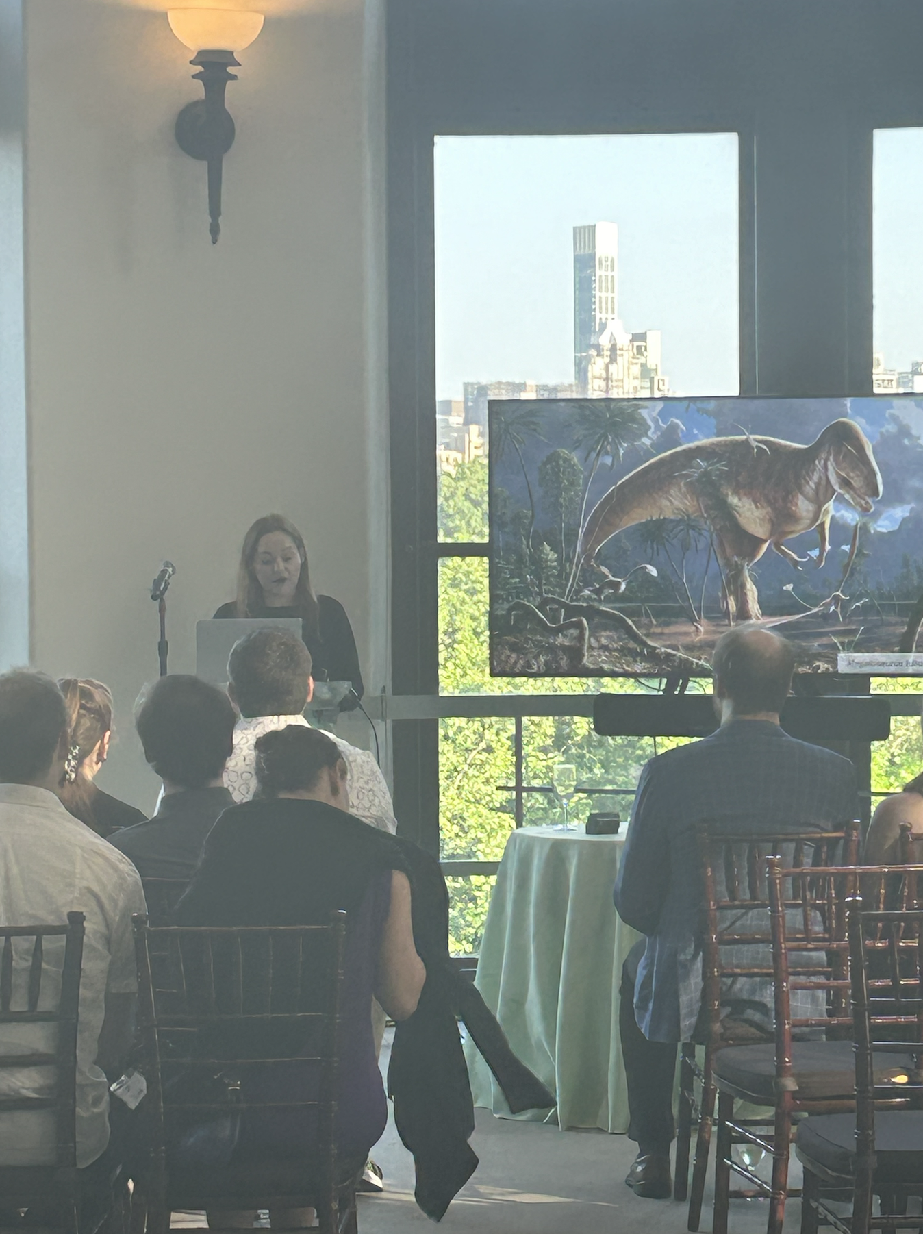 Introducing a speaker at Science After Dark: welcoming members, setting the tone for the evening, and highlighting the Museum’s mission for young patrons (the Junior Council).