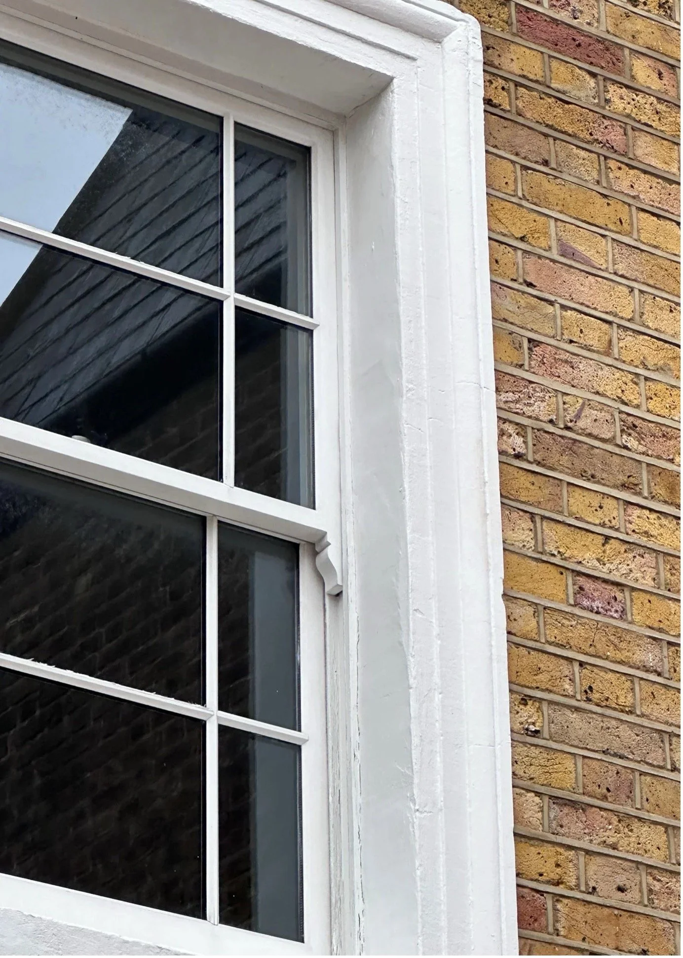 New double glazed heritage window at Eucalyptus House, with mullion arrangement, sash horns and frame detailing matched to the original Victorian sash windows.