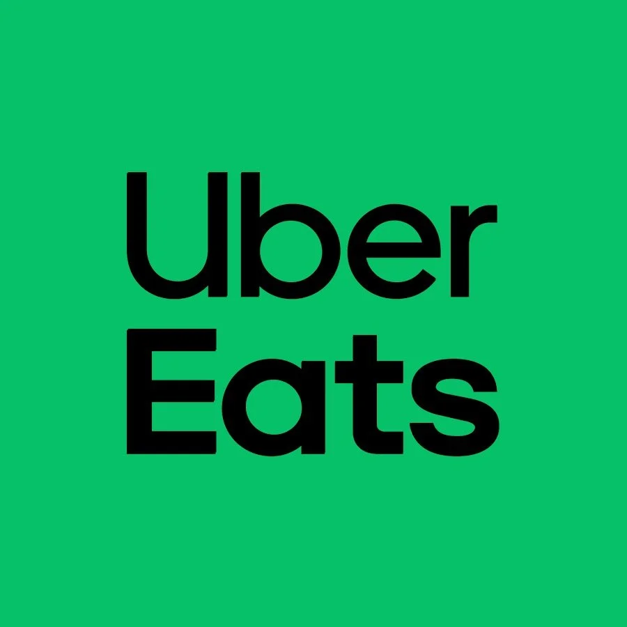 Uber Eats logo with green background and black text.