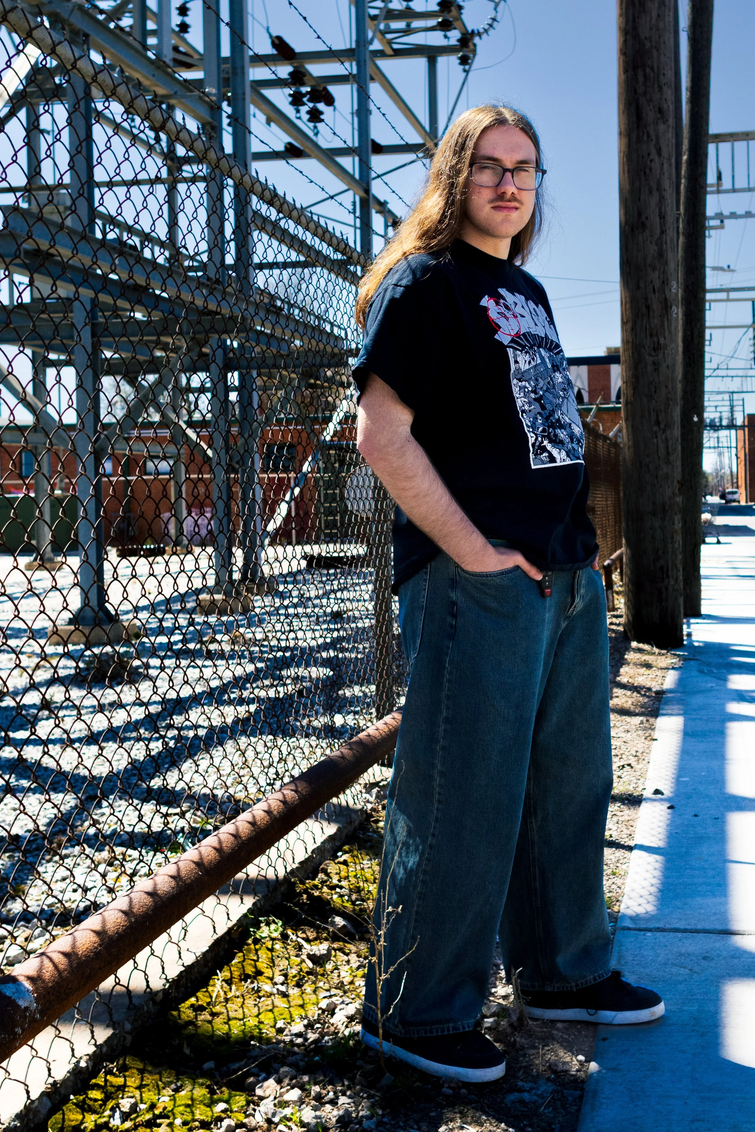 Senior photo near power relay. Norman, OK.