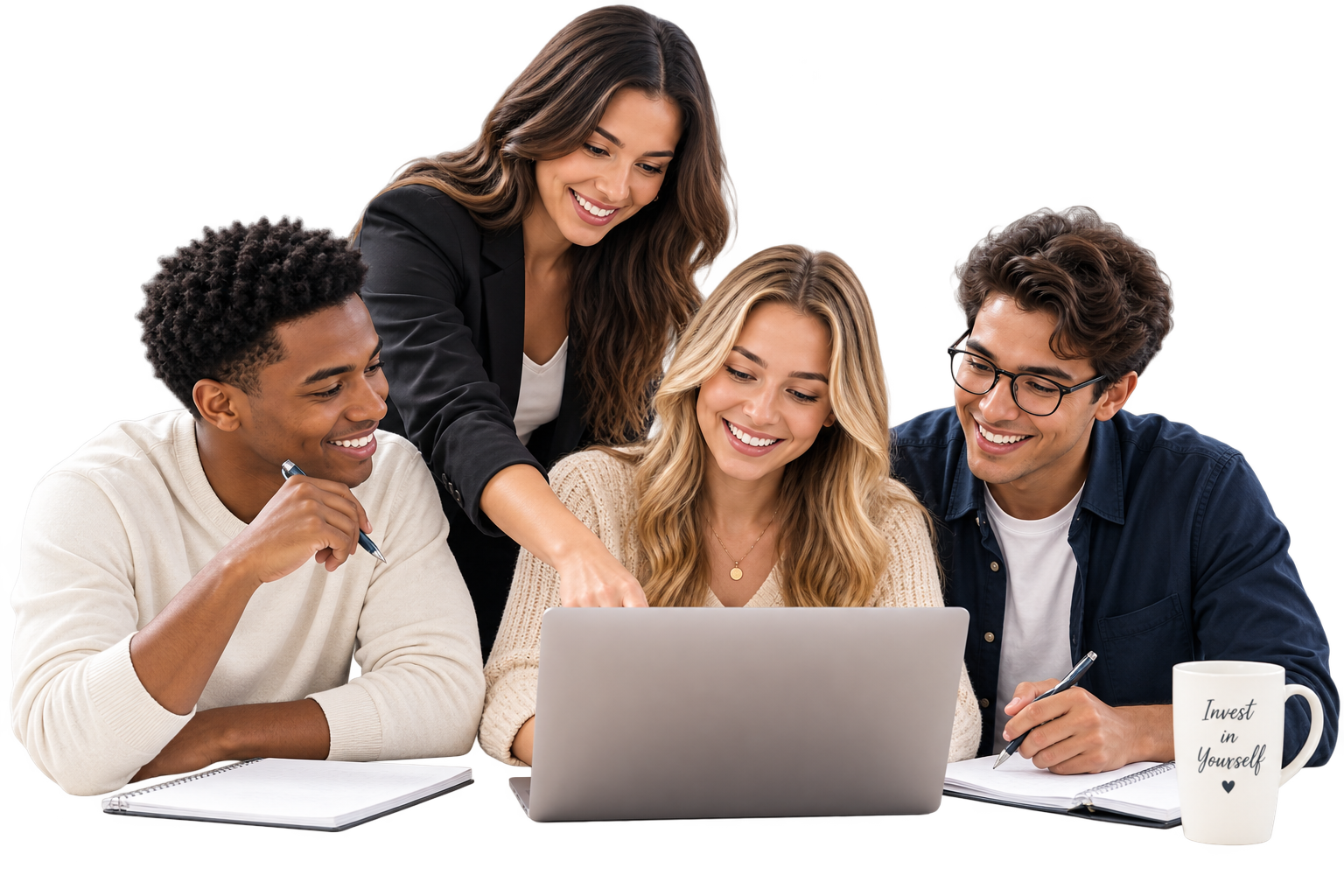 A diverse group of five young people gathered around a laptop, smiling and collaborating, with notebooks and a coffee mug that reads 'Invest in Yourself' on the table.