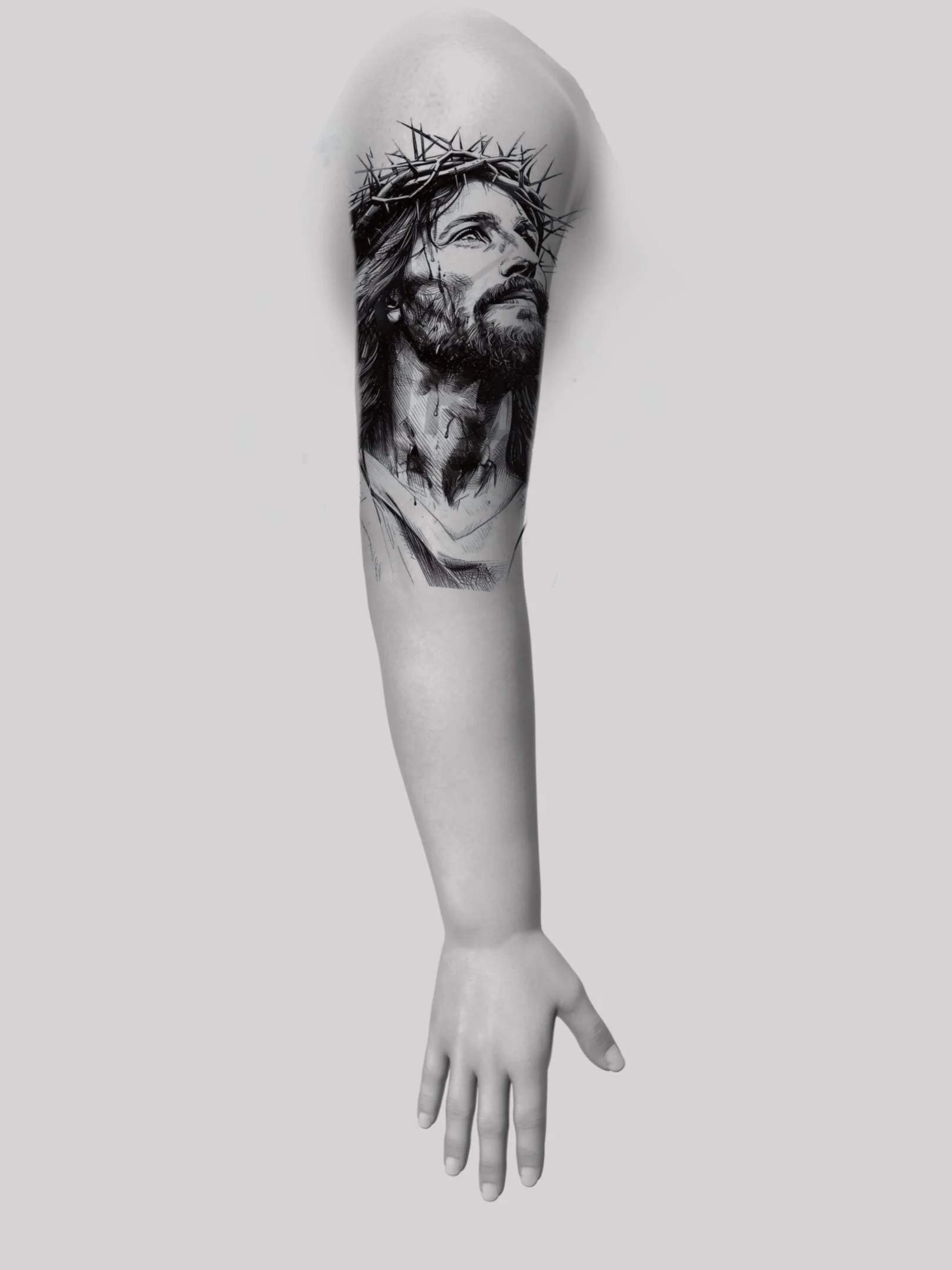 A tattoo of Jesus Christ with a crown of thorns on a person's arm.